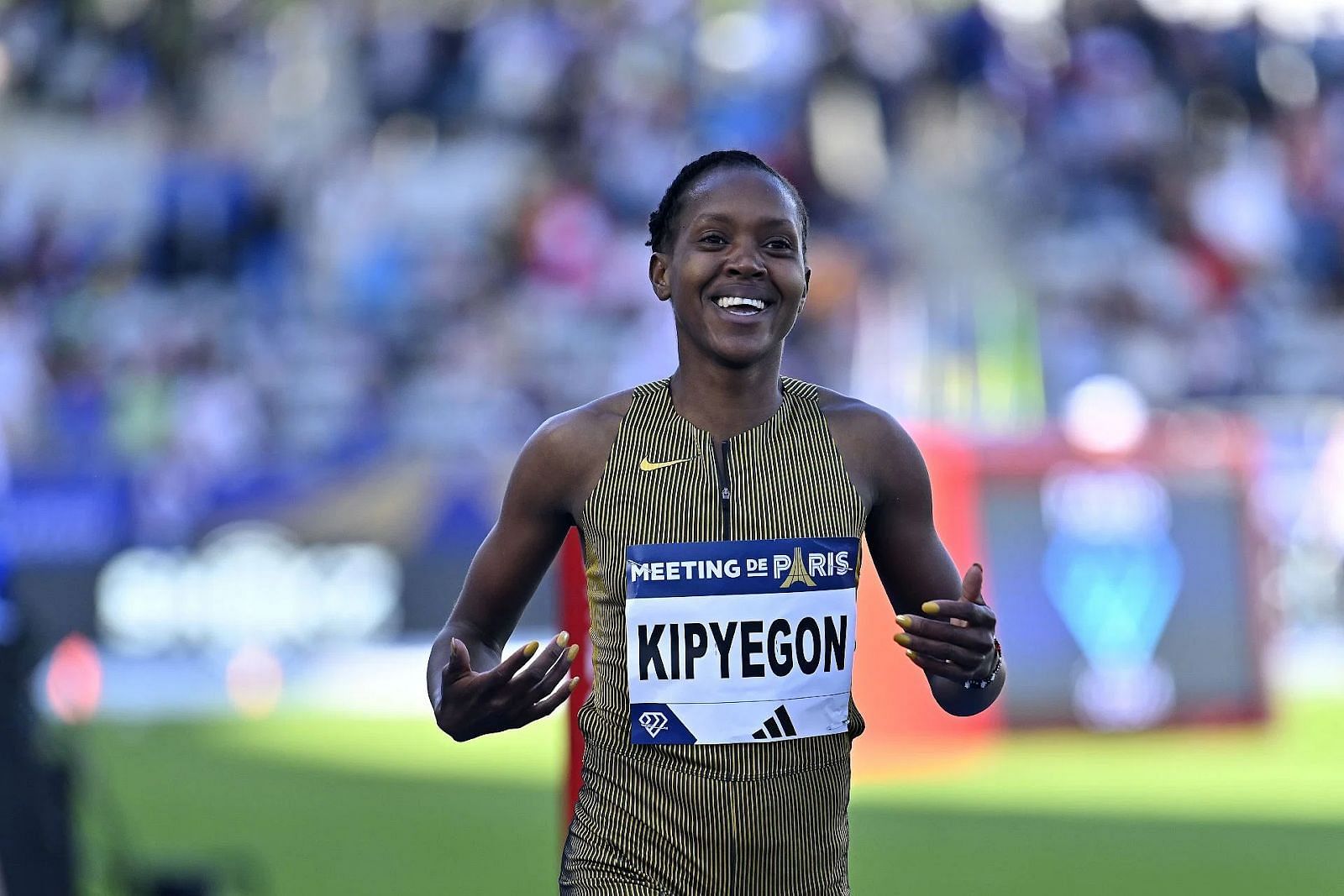 How much did Faith Kipyegon make for breaking the world record