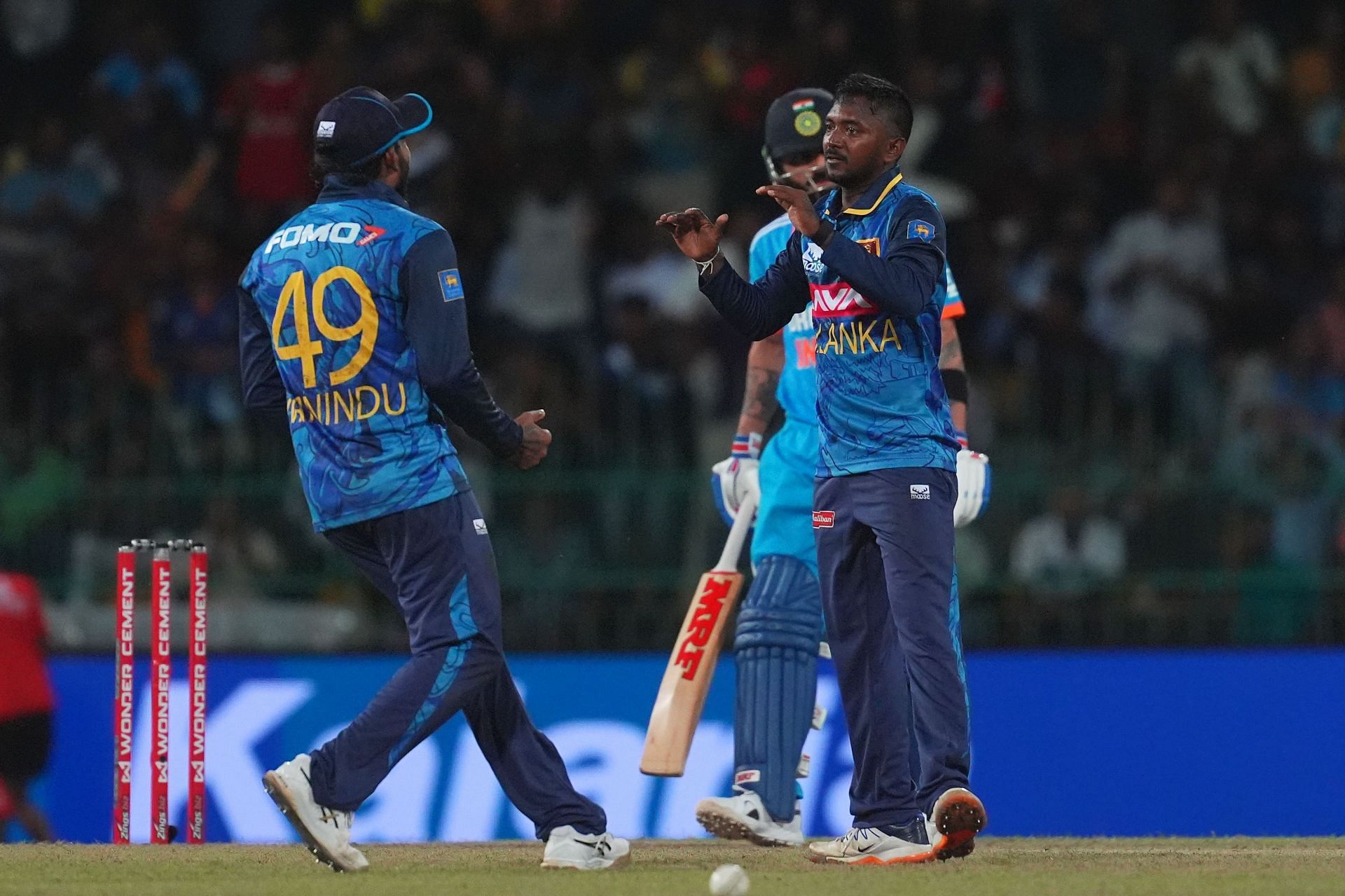 Akila Dananjaya (R) celebrates a wicket in the first ODI against India (Image Credits: Getty Images)