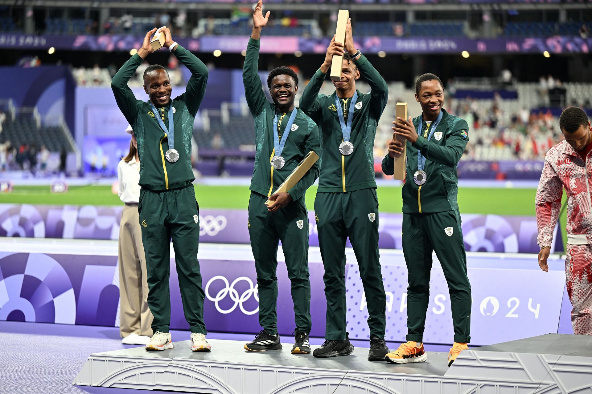 Bayanda Walaza along with his teammates at the podium for the Men&#039;s 4x100m relay event at Paris Olympics 2024 [Image Source: Getty]