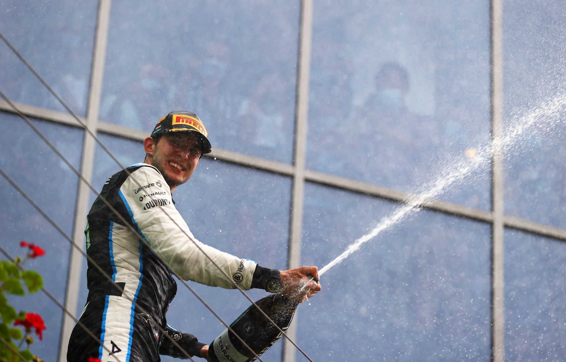 Esteban Ocon of France and Alpine F1 Team celebrates on the podium (GETTY)