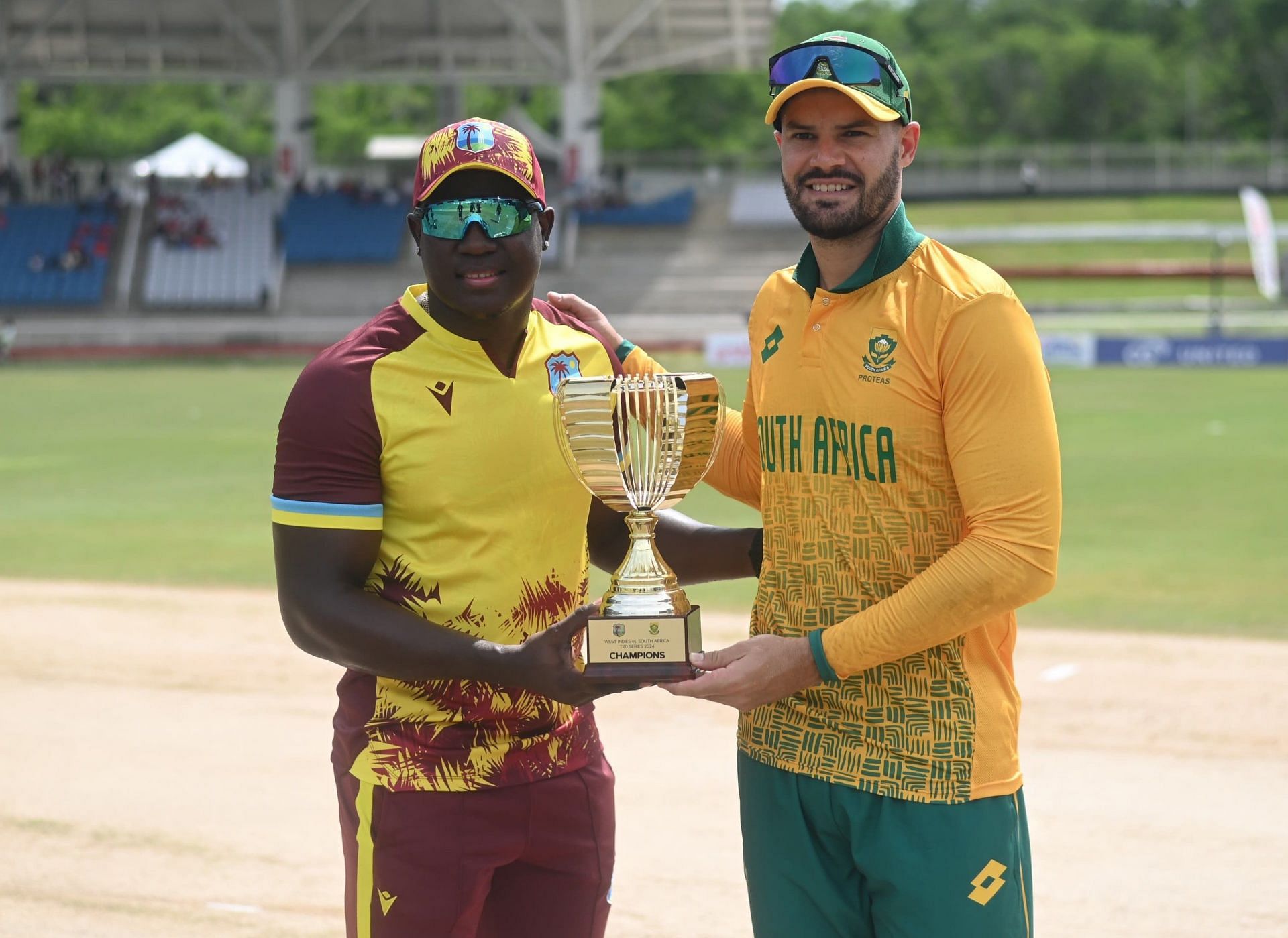 Rovman Powell &amp; Aiden Markram holding the T20I series Cup