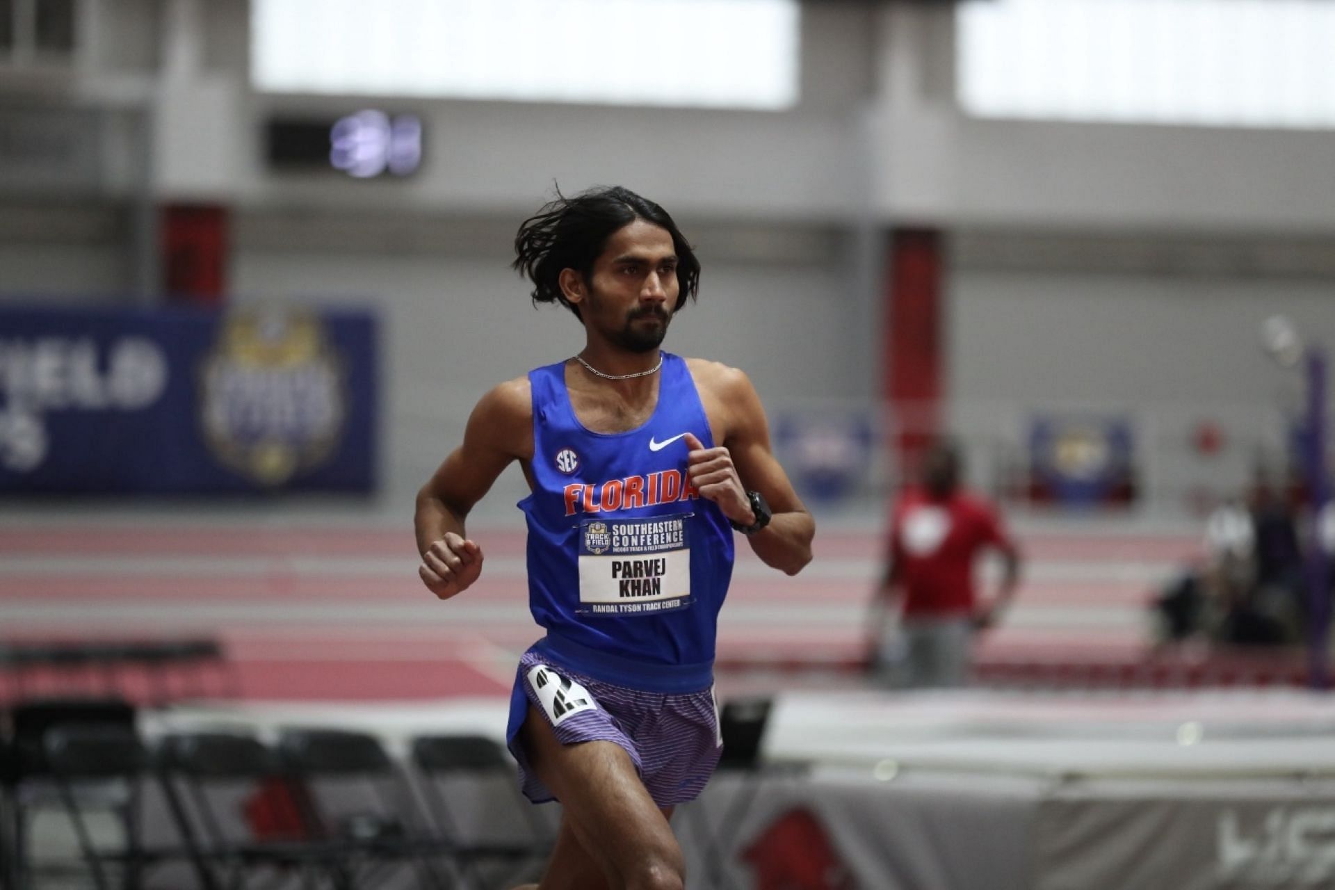 Parvej Khan running at an indoor SEC event for Florida Gators [Image Source: Parvej Khan