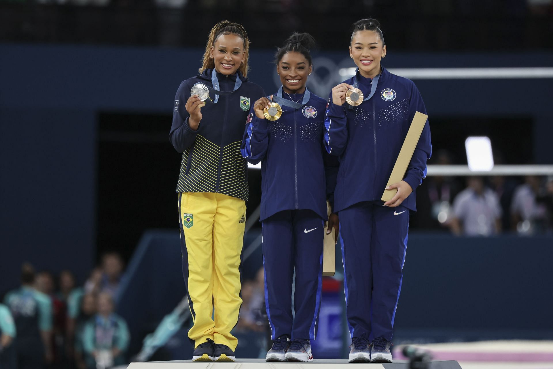 Simone Biles and Suni Lee with their all-around medals