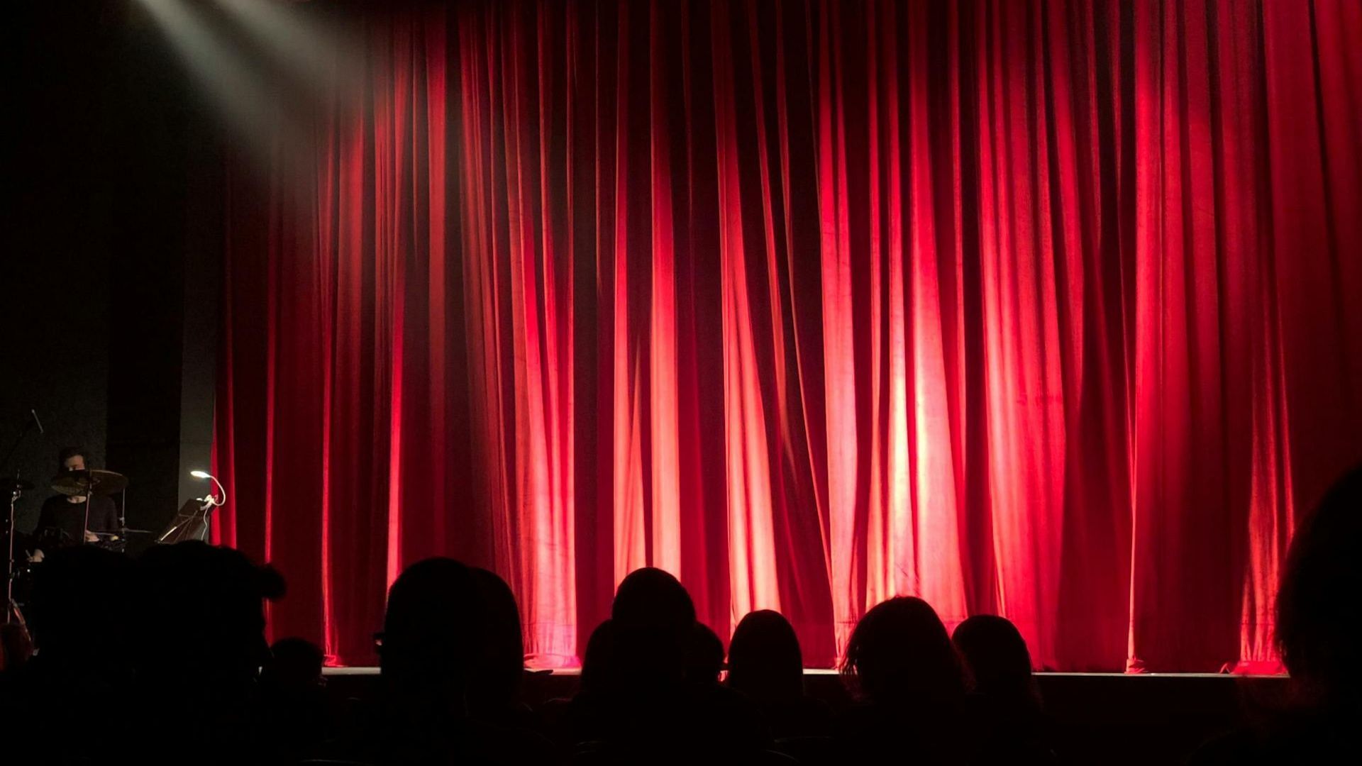 One of the theatre members was found suspicious (Image via Pexels/Monica Silvestre )