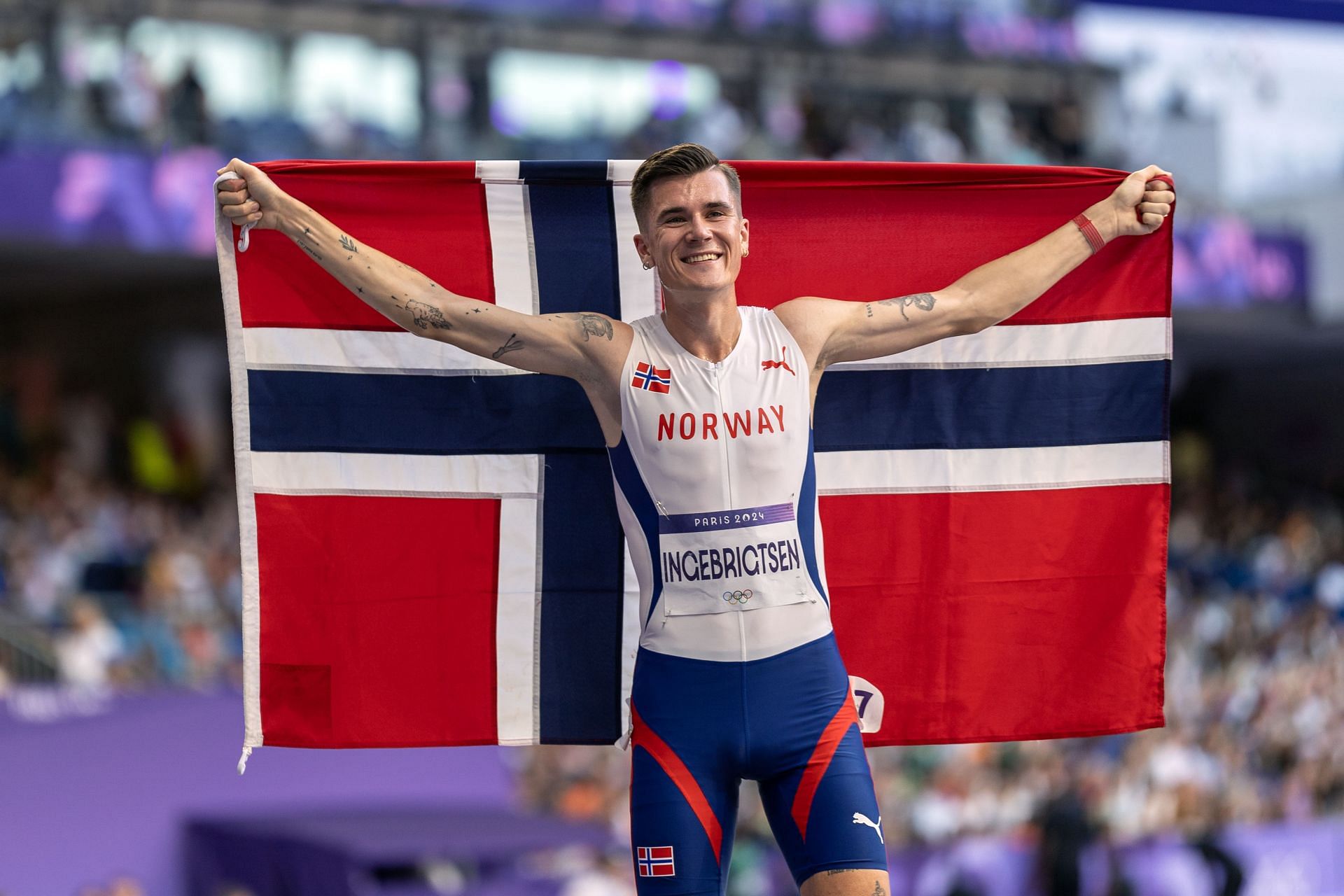 Jakob Ingebrigtsen celebrates his gold medal win in the Men&#039;s 5000m Final at the Paris Olympics 2024. (Photo by Tim Clayton/Corbis via Getty Images)