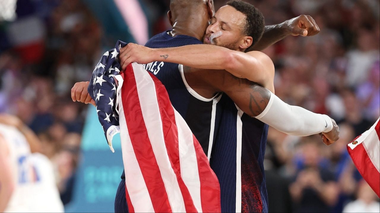 Steph Curry drapes himself with USA Flag as he gets his first Olympic gold medal [Credit: Team USA Basketball X handle]