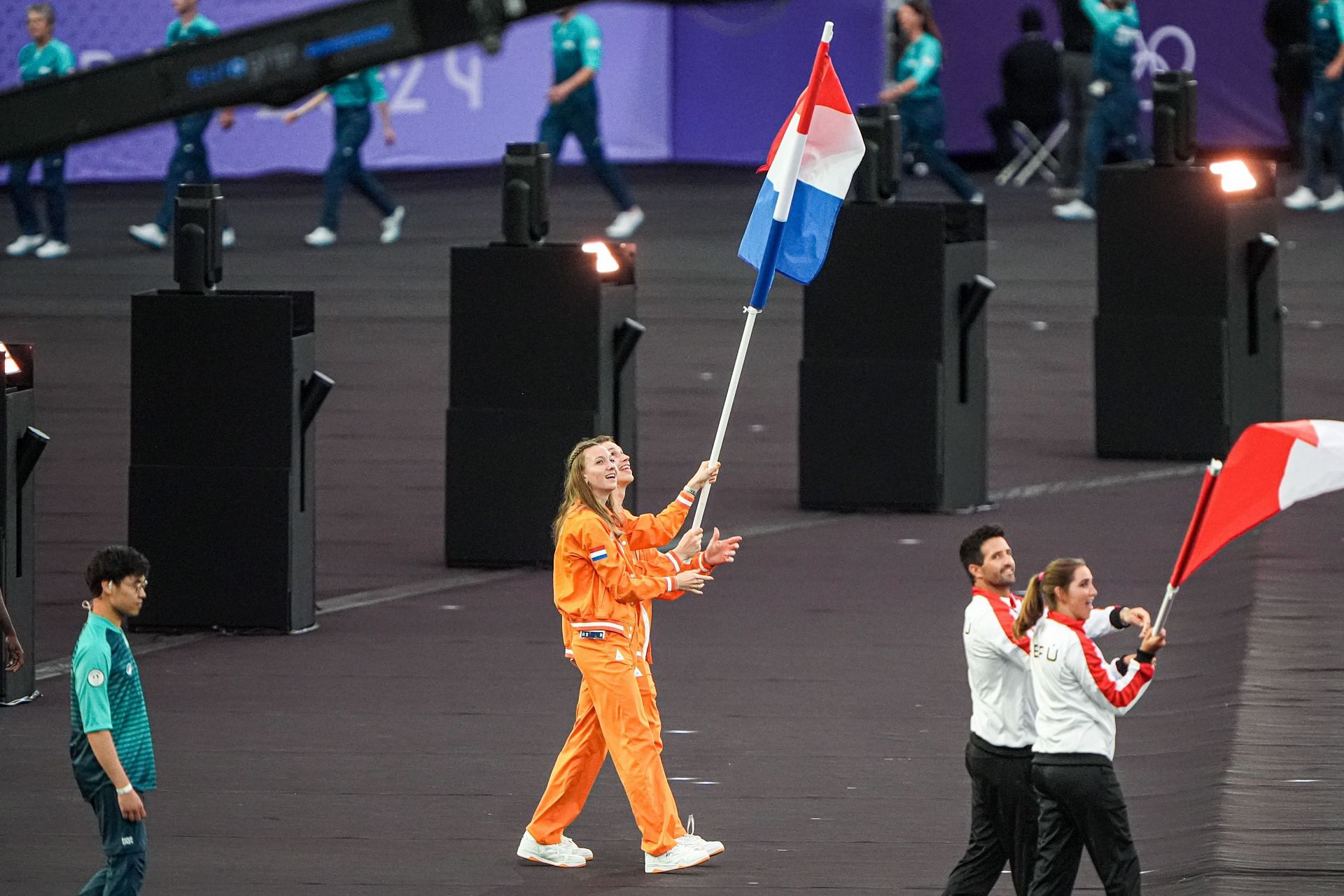 Femke Bol of Netherlands carrying the Dutch flag during the closing ceremony of the Paris Olympics 2024 [Image Source: Getty]