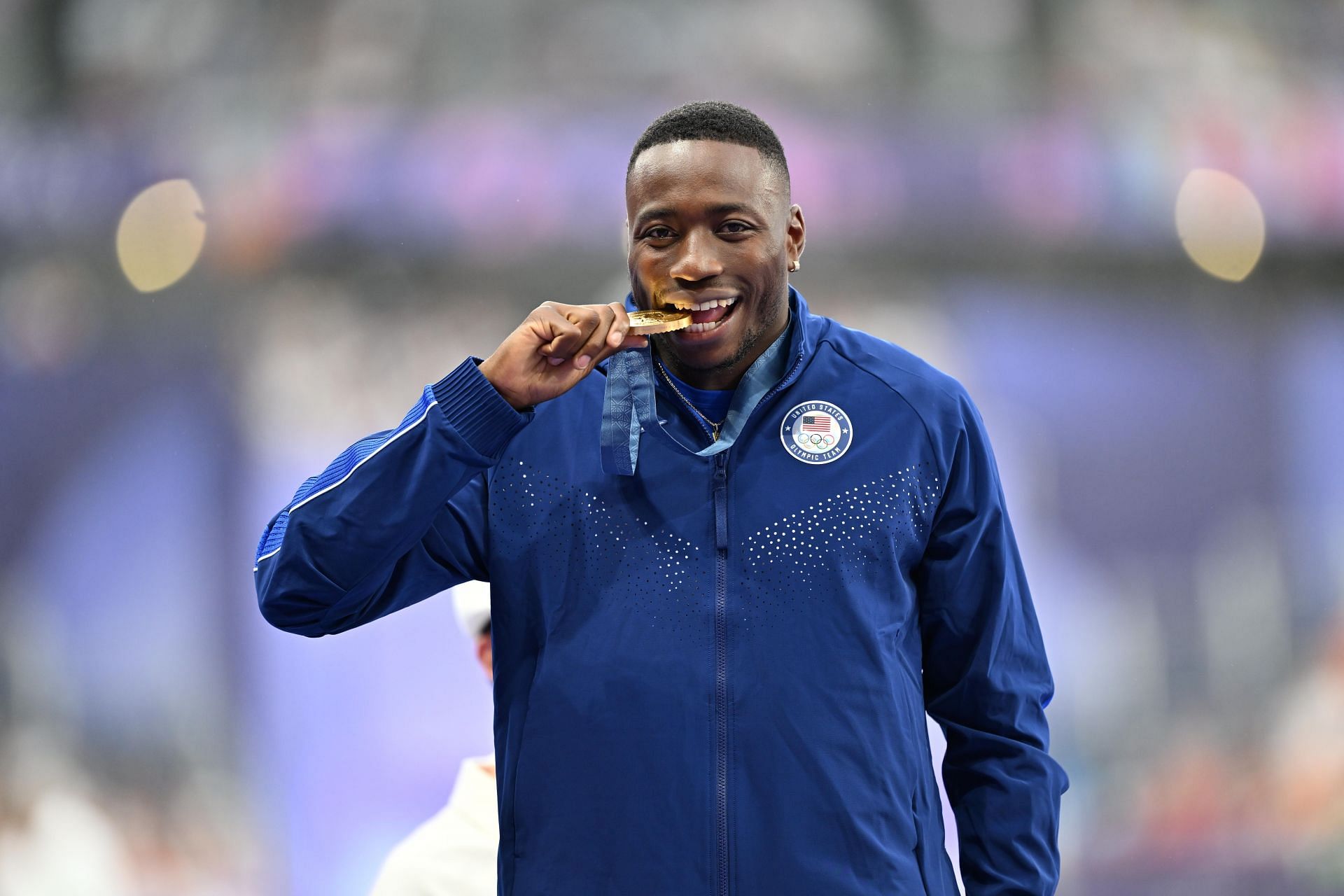 Grant Holloway celebrates during the Men&#039;s 110m Hurdles medal ceremony at the Olympic Games 2024. (Photo via Getty Images)