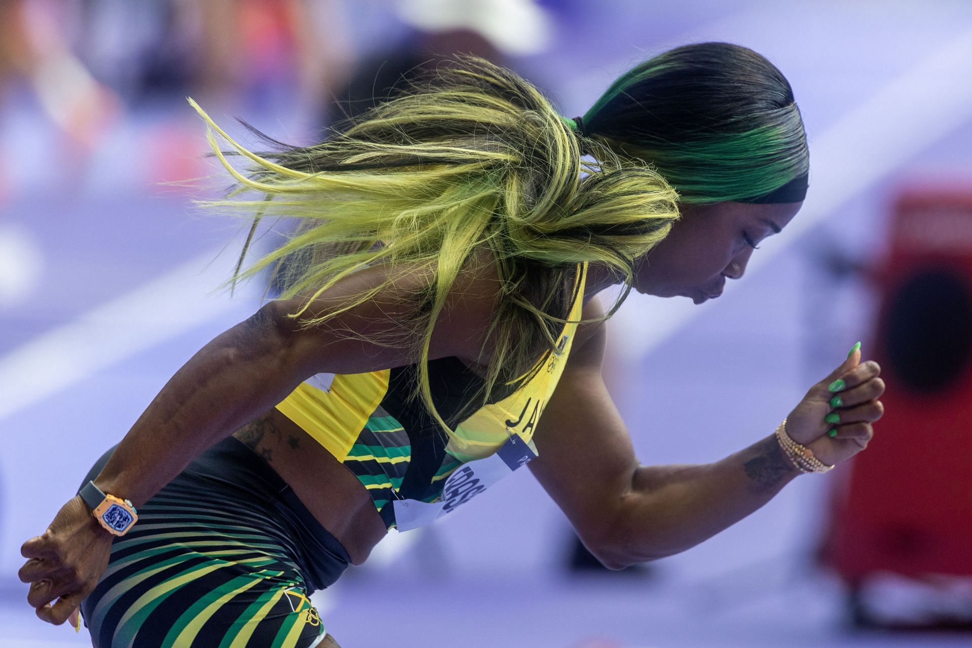 Shelly-Ann Fraser-Pryce preparing for the 100m preliminaries at the Paris Olympics 2024 [Image Source: Getty]