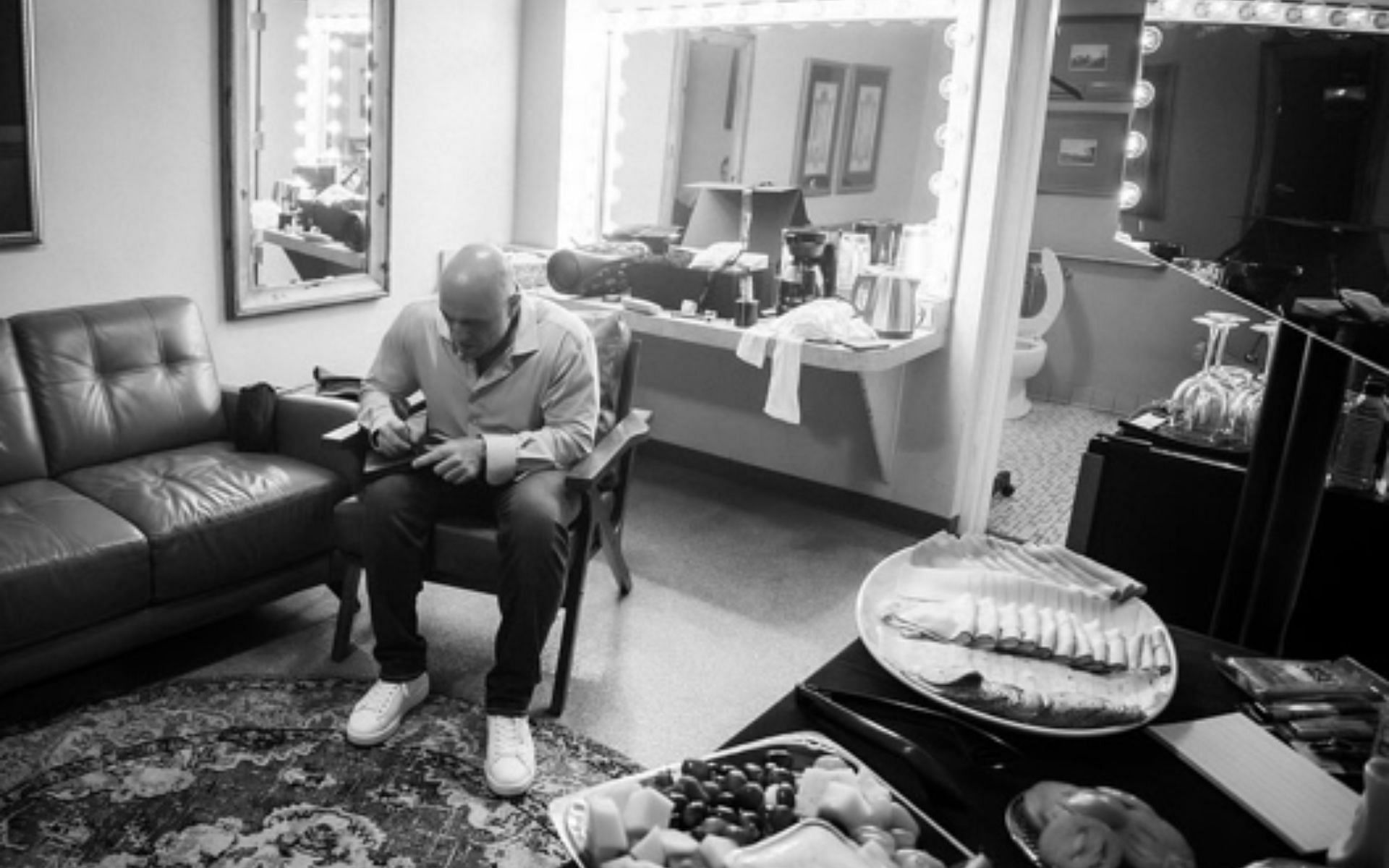 Joe Rogan having a quiet moment backstage. (Screenshot via @troyconrad on Instagram)