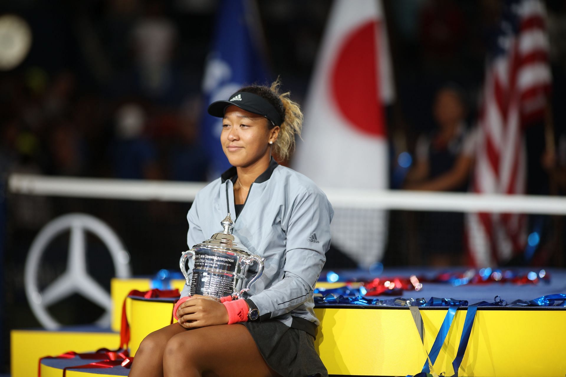 Naomi Osaka with the US Open trophy - Source: Getty