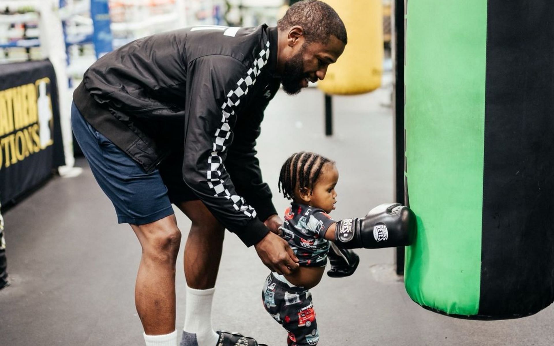 Floyd Mayweather Jr. with his grandson [Image courtesy: @floydmayweather on Instagram]