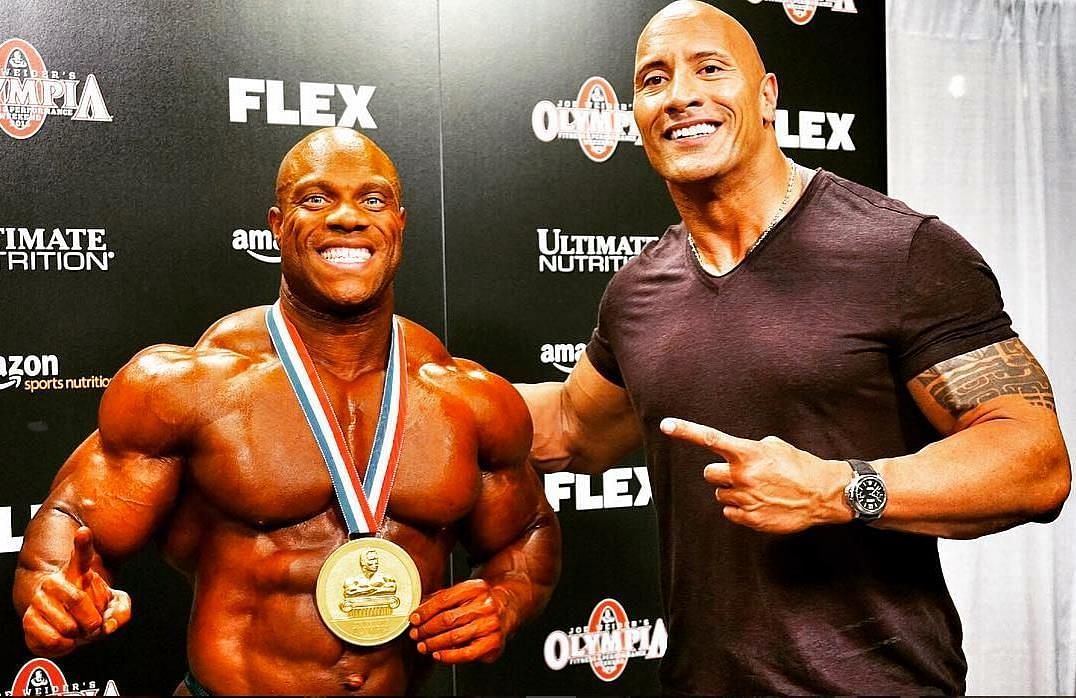 Phil Heath with Dwayne Johnson, executive producer of the documentary on the former