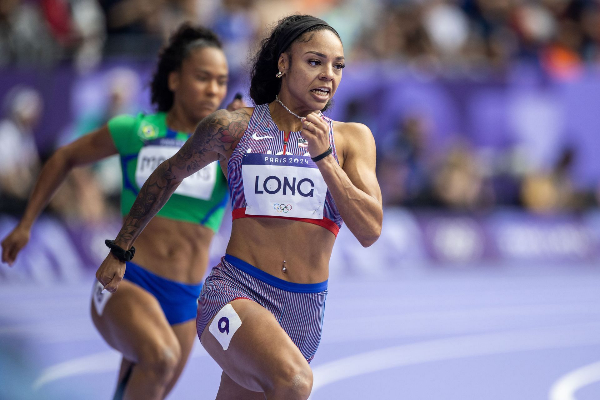 McKenzie Long (R) in action during the women&#039;s 200m event at the 2024 Paris Olympics [Image Source: Getty]