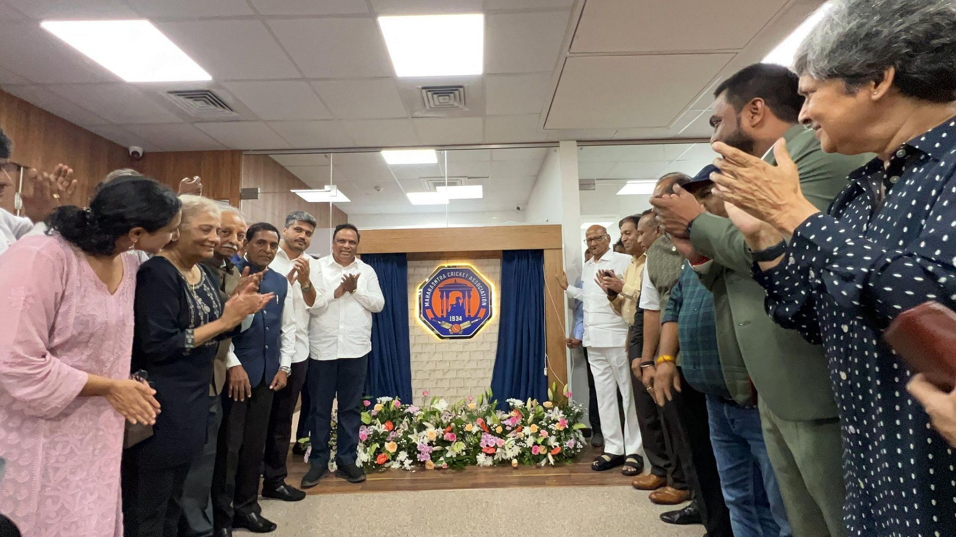 Maharashtra Cricket Association members and invitees unveiling the new logo. (PC: MCA)