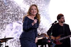 "This scene was so fit for a movie" — Internet reacts to Adele performing in torrential rain during Munich residency