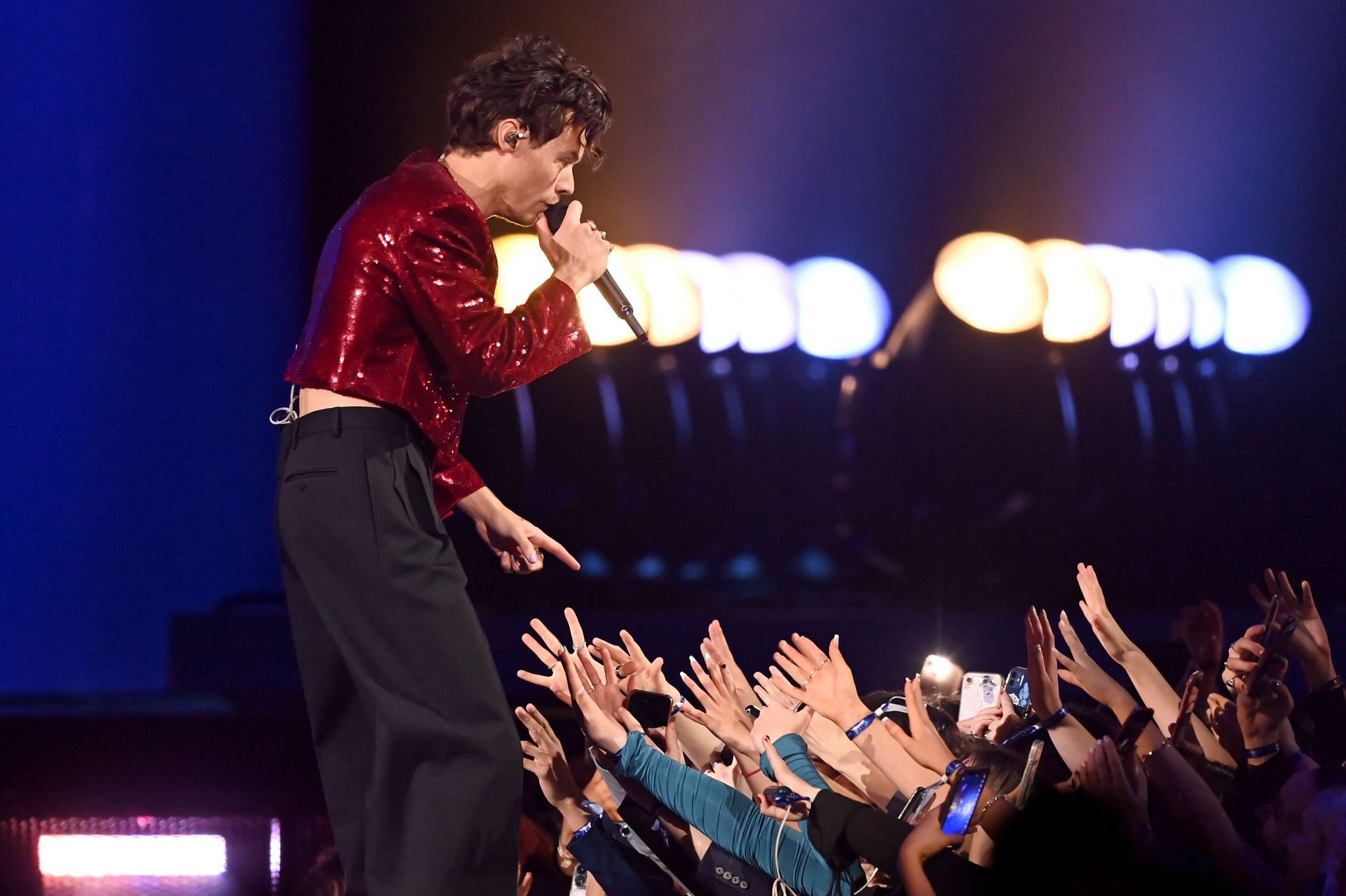 Harry Styles debuted in 2011 with the One Direction band (Image via Getty/Dave J Hogan)