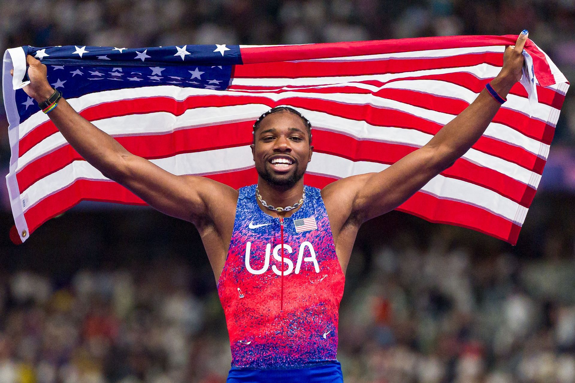 Noah Lyles of Team United States celebrates winning the gold medal in the Men&#039;s 100m Final on day nine of the Olympic Games Paris 2024 at Stade de France on August 04, 2024 in Paris, France. (Photo by Andy Cheung/Getty Images)