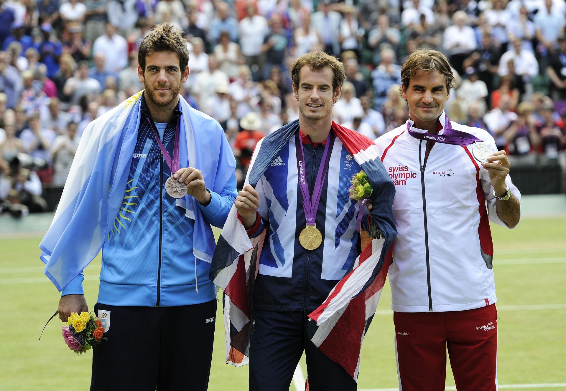 Juan Martin del Potro (L), Andy Murray (C), and Roger Federer (R) with their Olympic medals won at the 2012 London Games| Getty