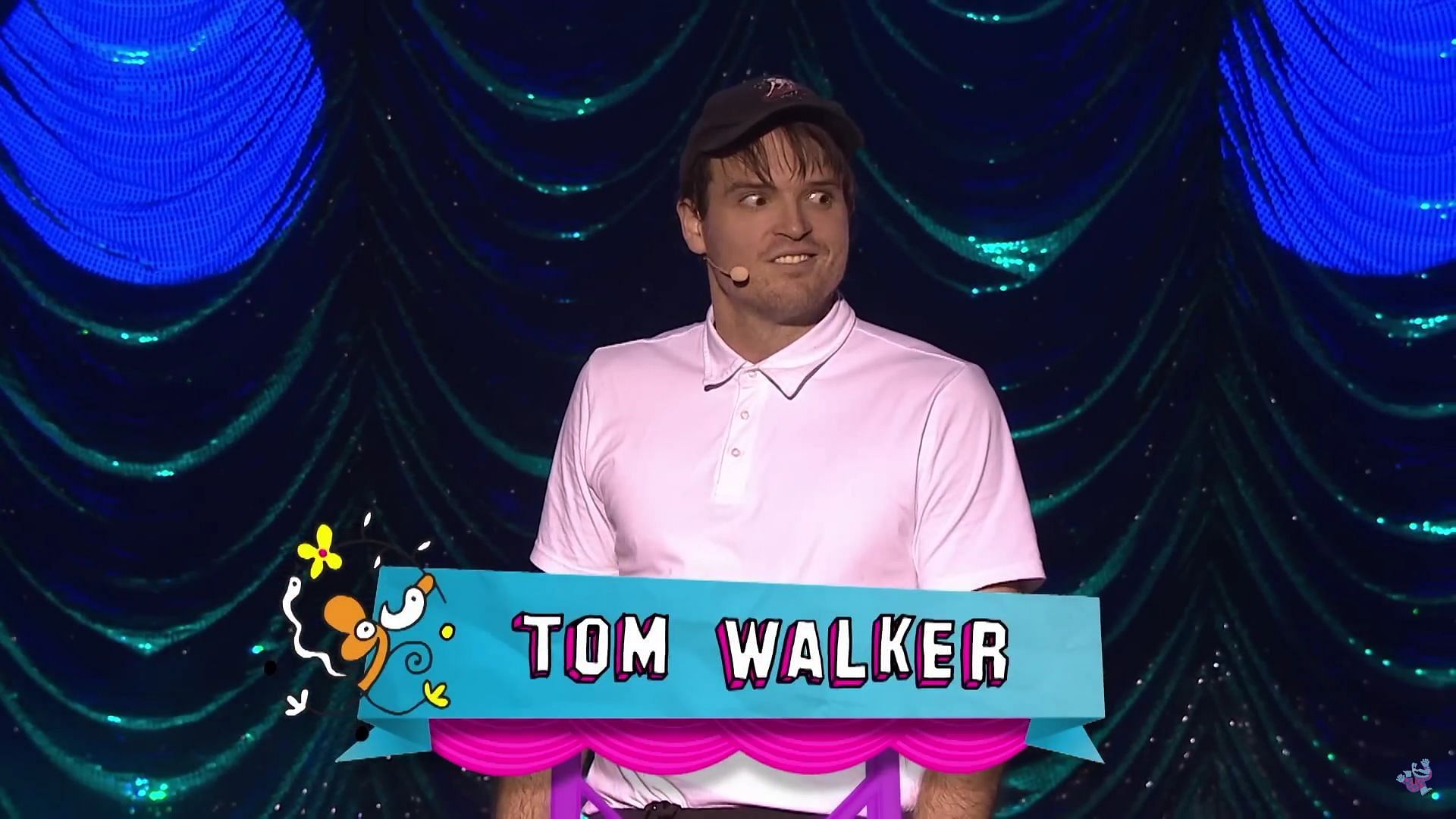 Tom regularly does impressions during his comedy sets (Image via TheMelbComedyFest/YouTube)