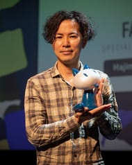 Isayama at the Angoulême International Comics Festival in 2023.