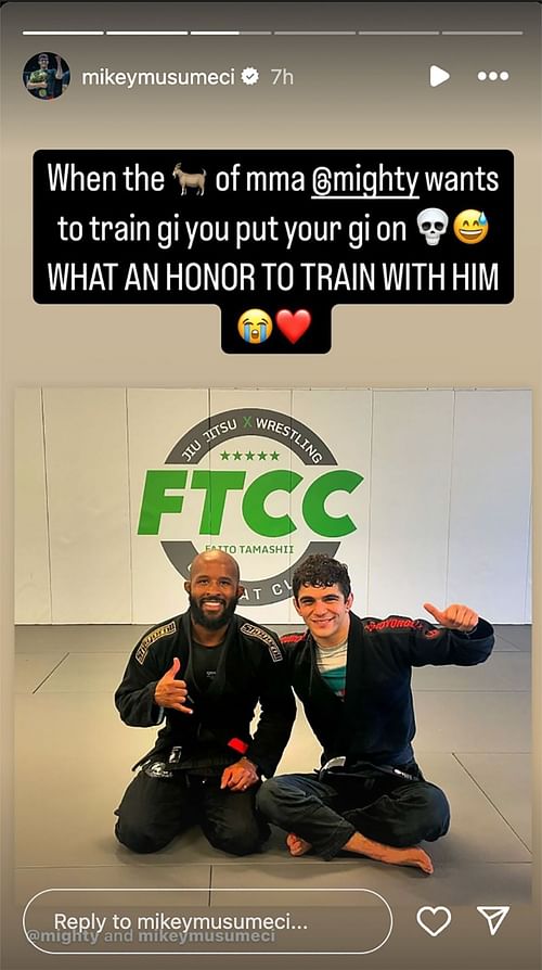 Mikey Musumeci (right) trains with Demetrious Johnson (left).