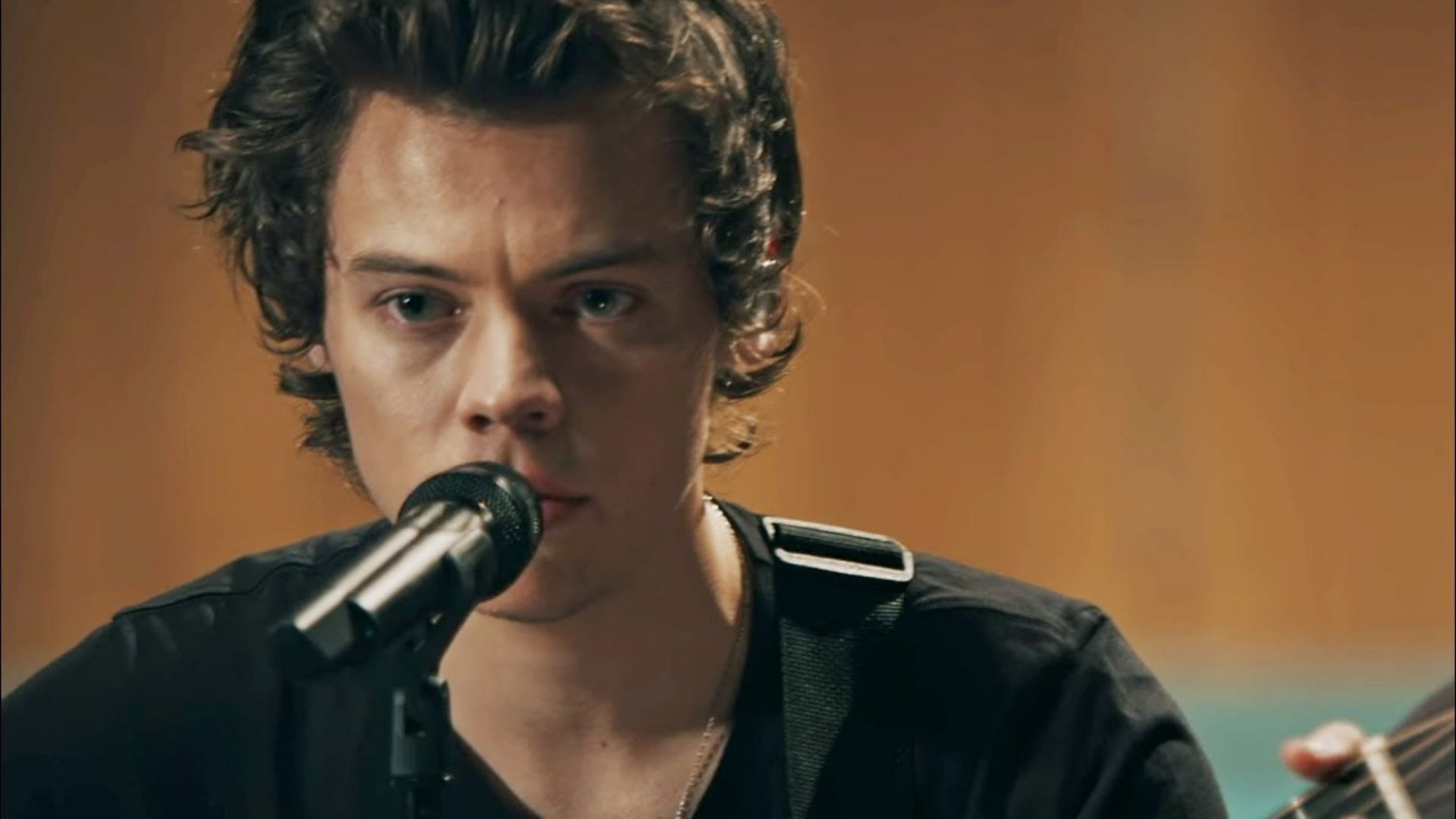 Harry Styles performing Two Ghosts live in studio (Image via YouTube/ Harry Styles)