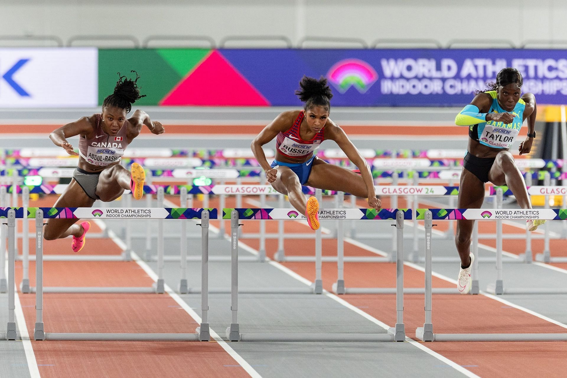 Mariam Abdul-Rashid of Canada, Masai Russell of the United States and Charisma Taylor of Bahamas in the womens 60m Hurdles Round 1 during day three of the World Athletics Indoor Championships at Emirates Arena on March 3, 2024 in Glasgow, Scotland. (Photo via Getty)