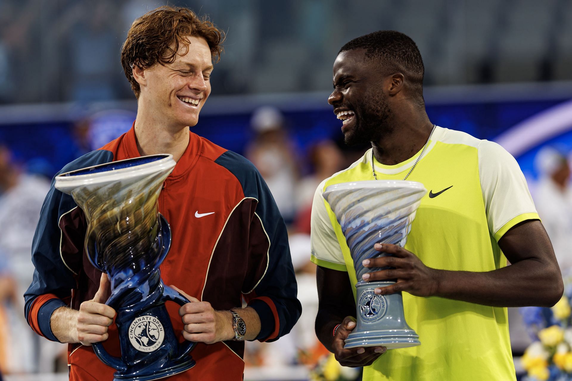 Jannik Sinner (L) and Frances Tiafoe with their Cincinnati Open 2024 trophies. (Image via Getty)