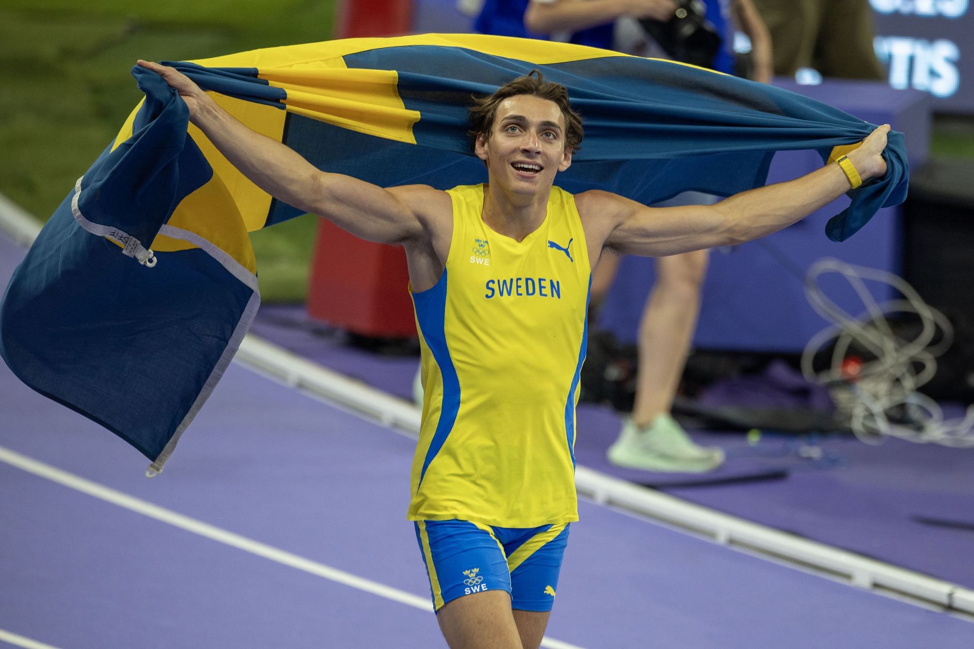 Mondo Duplantis celebrates after winning the gold medal and breaking the world record during the Men&#039;s Pole Vault Final during the 2024 Summer Olympic Games in Paris, France. (Photo via Getty Images)