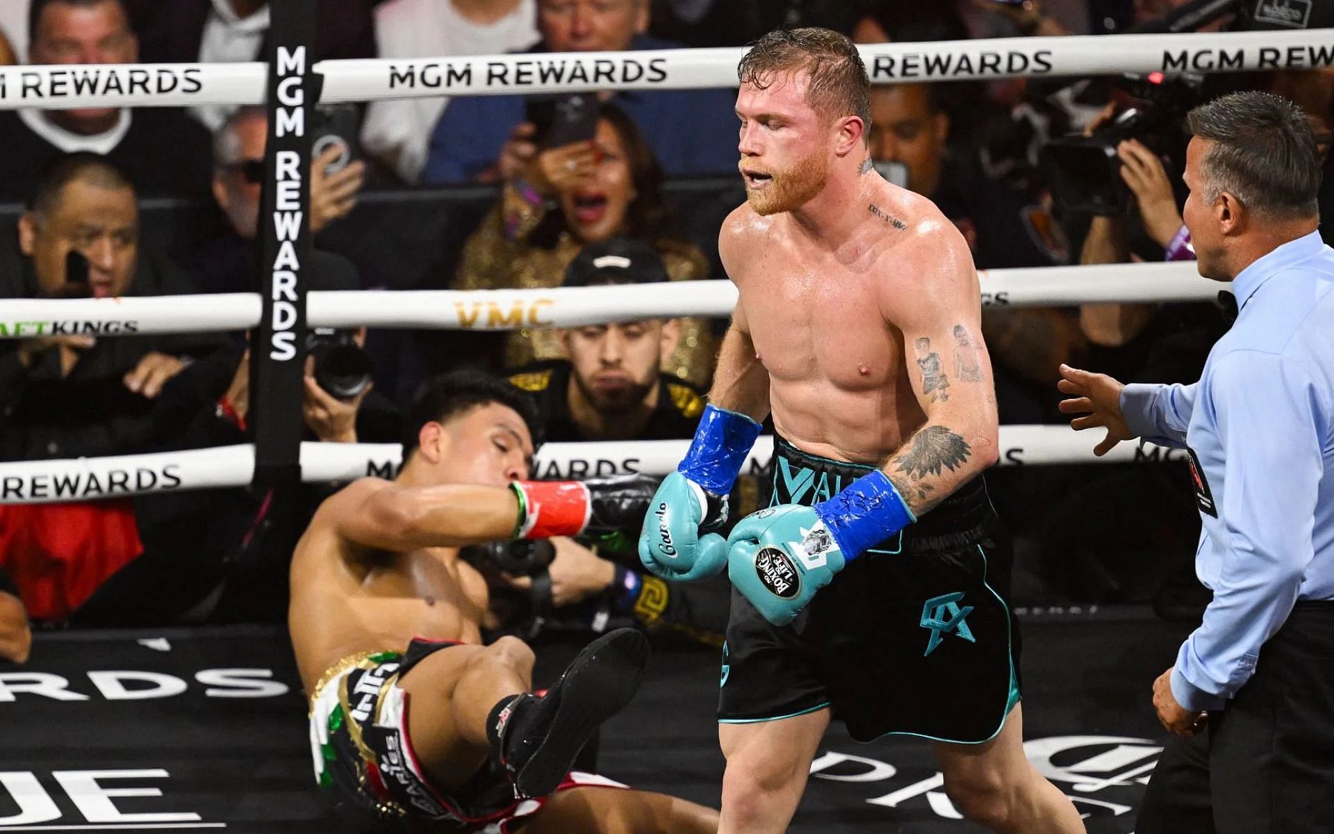 Canelo Alvarez (middle) admits to carrying Jaime Munguia (left) to the final bell during their fight [Image courtesy: Getty Images]