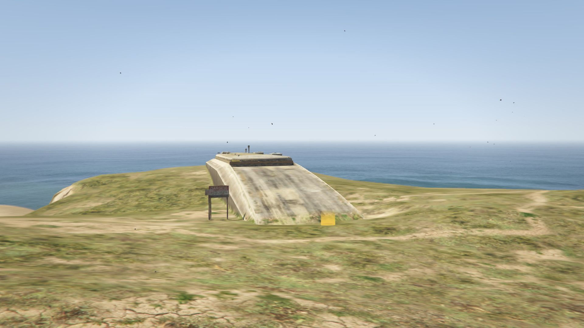 The outside view of the Los Santos Airbase Bunker in Chumash in Grand Theft Auto 5 Online (Image via Rockstar Games)