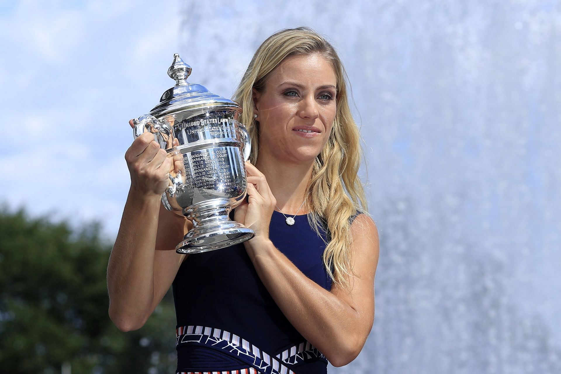 Angelique Kerber with the 2016 US Open Trophy - Source: Getty