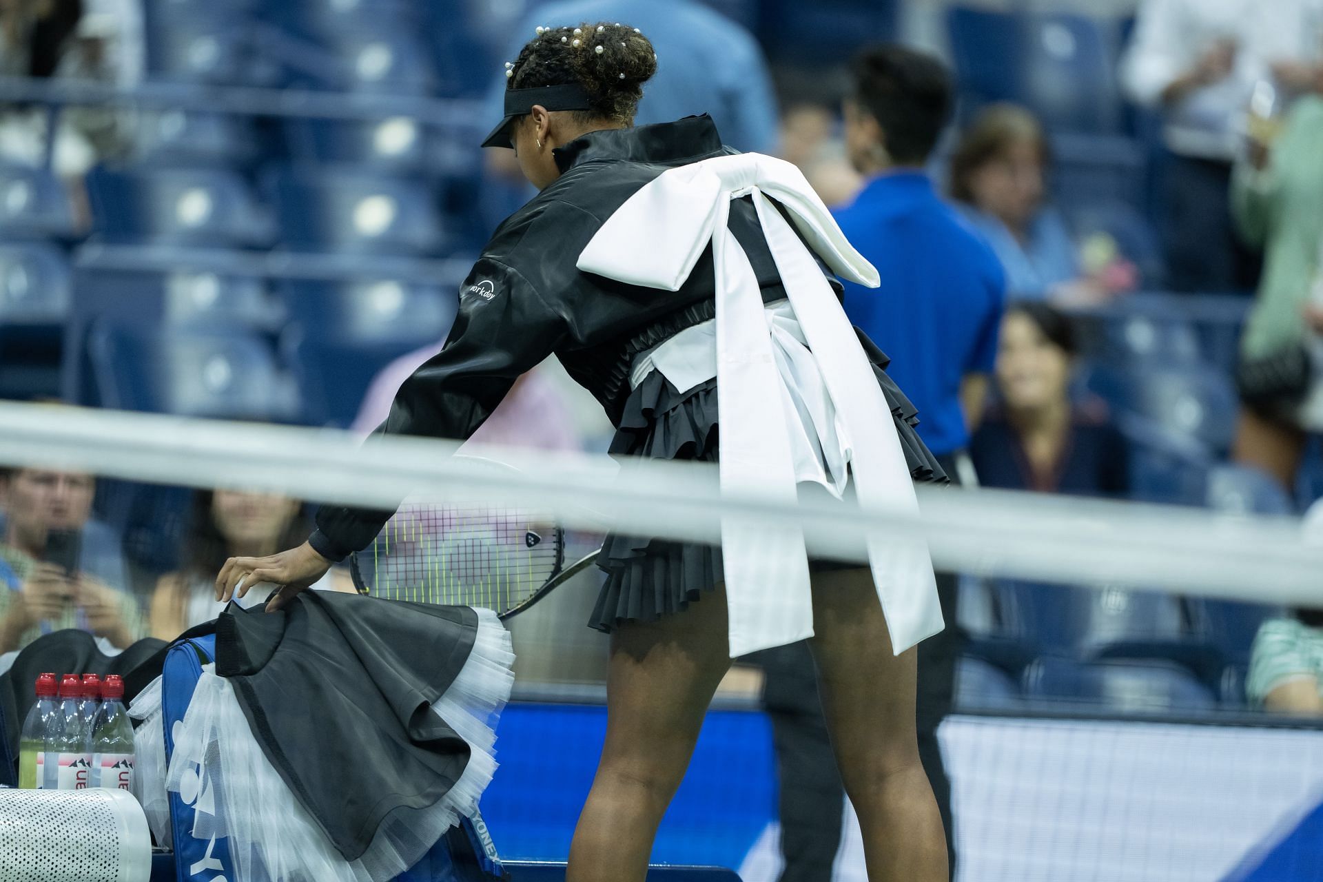 Naomi Osaka in her Japanese-inspired outfit with bows and frills at the 2024 US Open (Image: Getty)