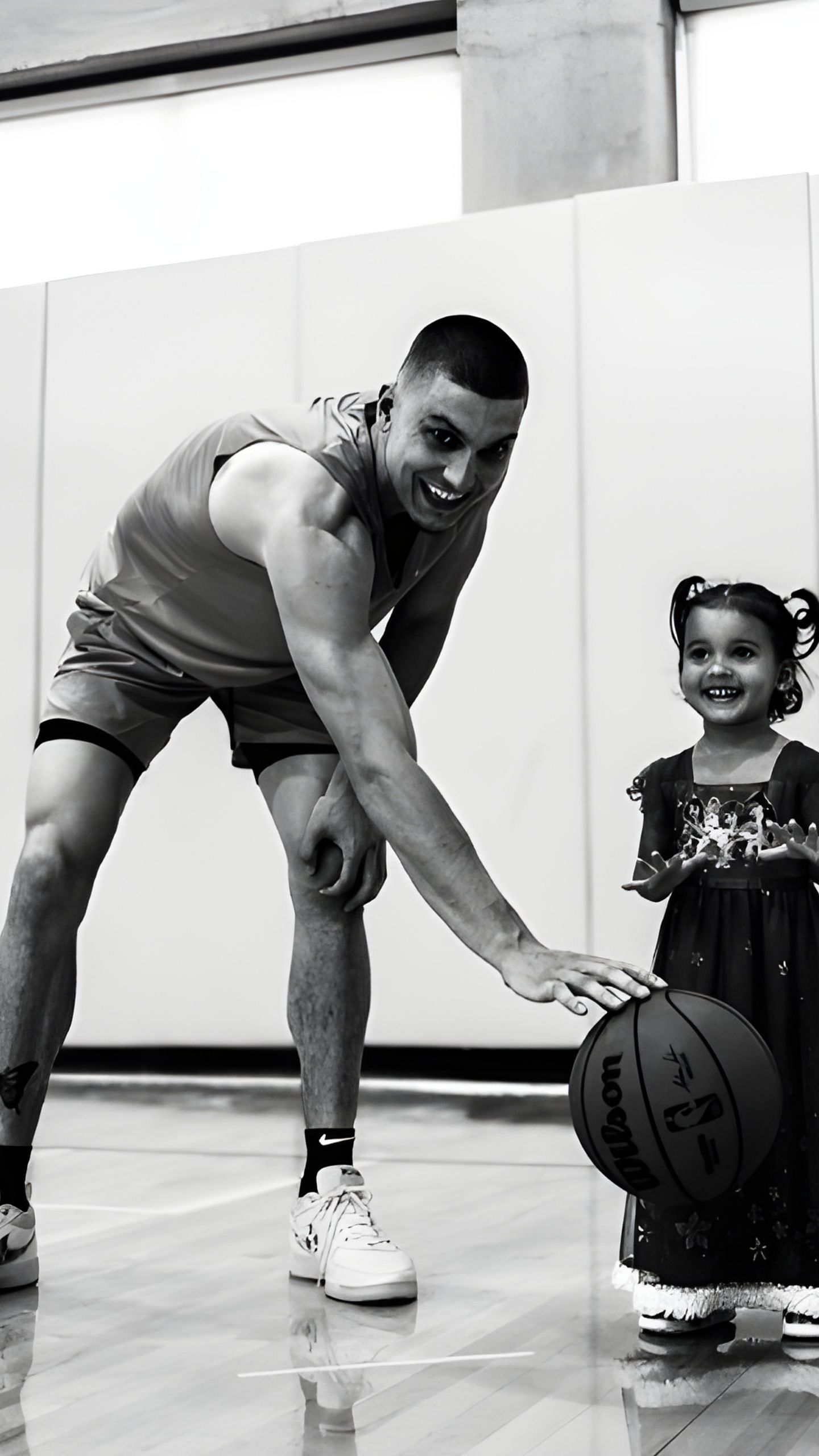 Herro playing with his daughter