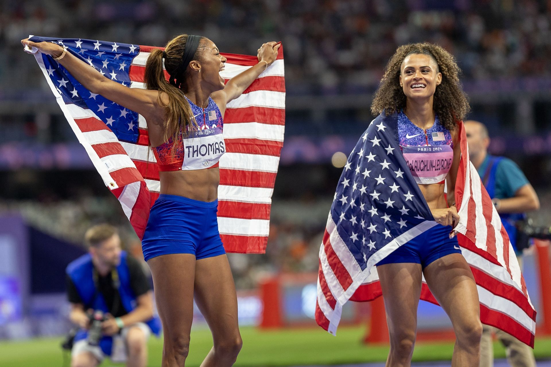 Gabby Thomas and Sydney McLaughlin-Levrone after winning the women&#039;s 4x400m relay at the Paris Olympics 2024 [Image Source: Getty]