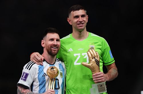 Lionel Messi (left) and Emiliano Martinez