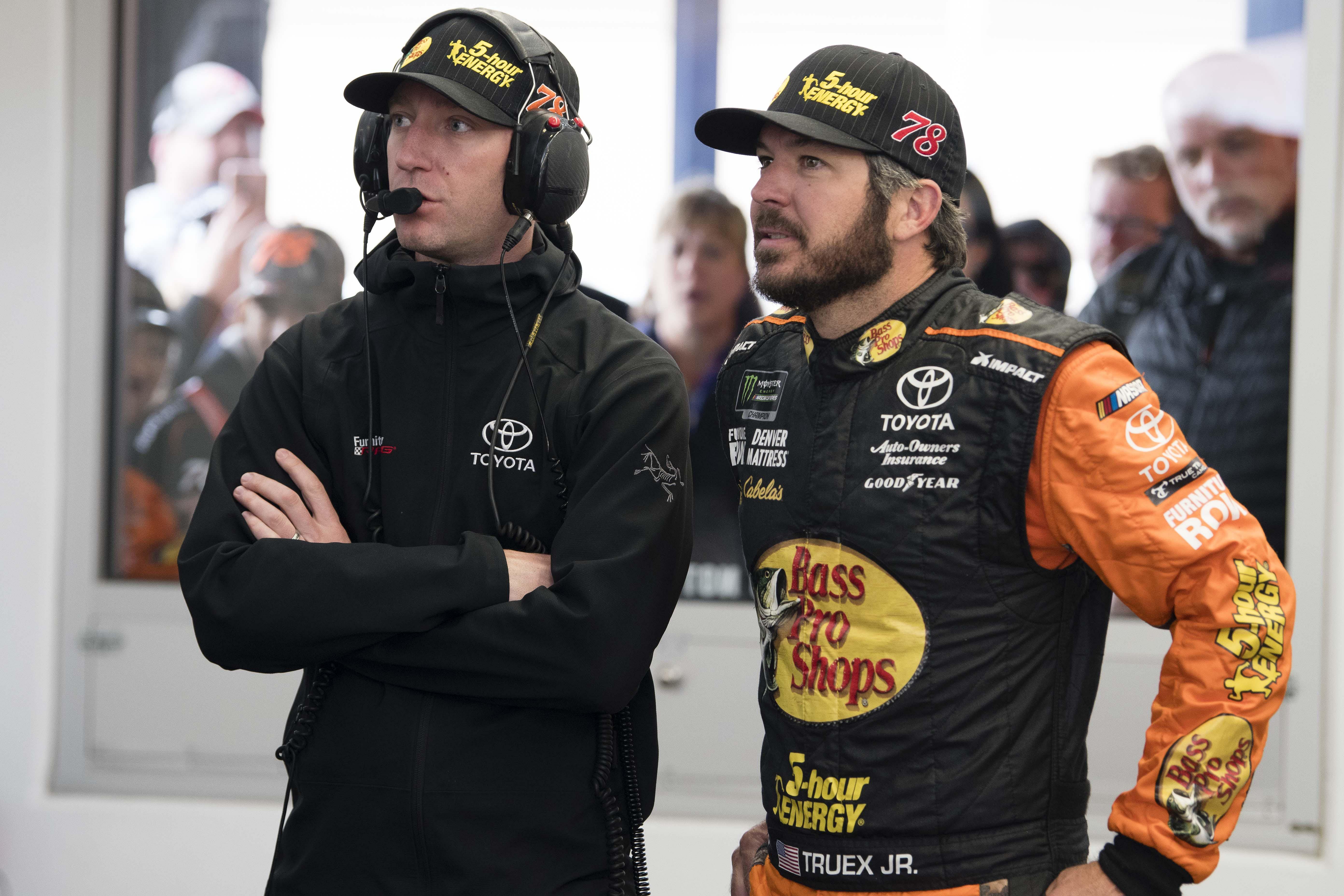 Martin Truex Jr. (right) and Cole Pearn (left) during practice for the 2018 Pennzoil 400 at Las Vegas Motor Speedway (Source: Imagn)