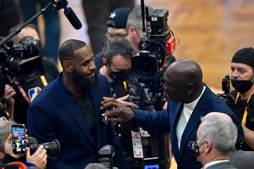 Lebron James and Michael Jordan on court during halftime during the 2022 NBA All-Star Game at Rocket Mortgage FieldHouse. Photo Credit: Imagn