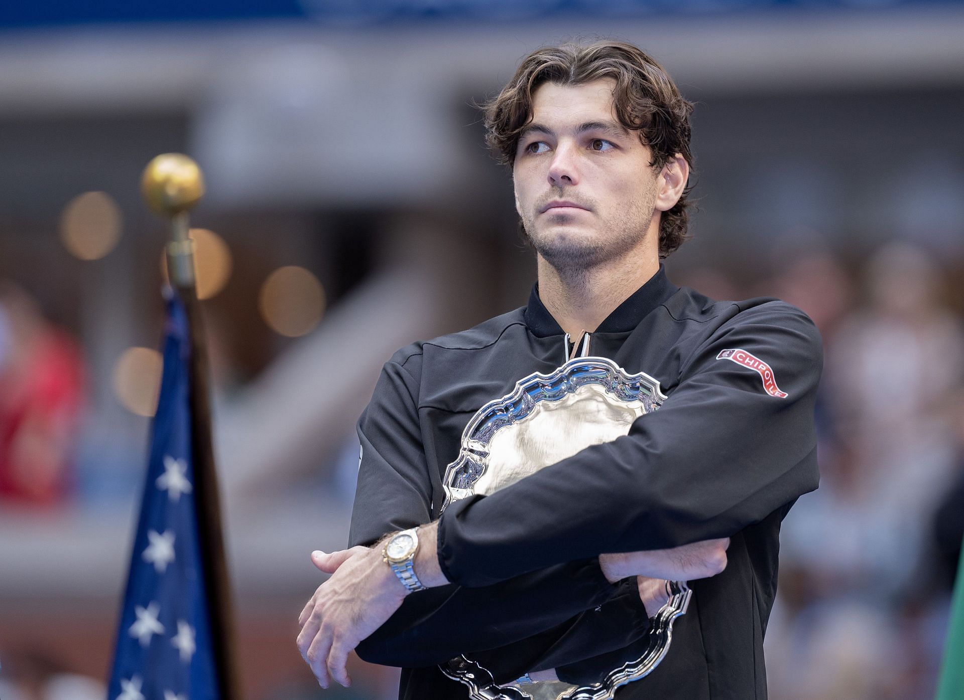 Taylor Fritz with the runner-up's plate at the 2024 US Open