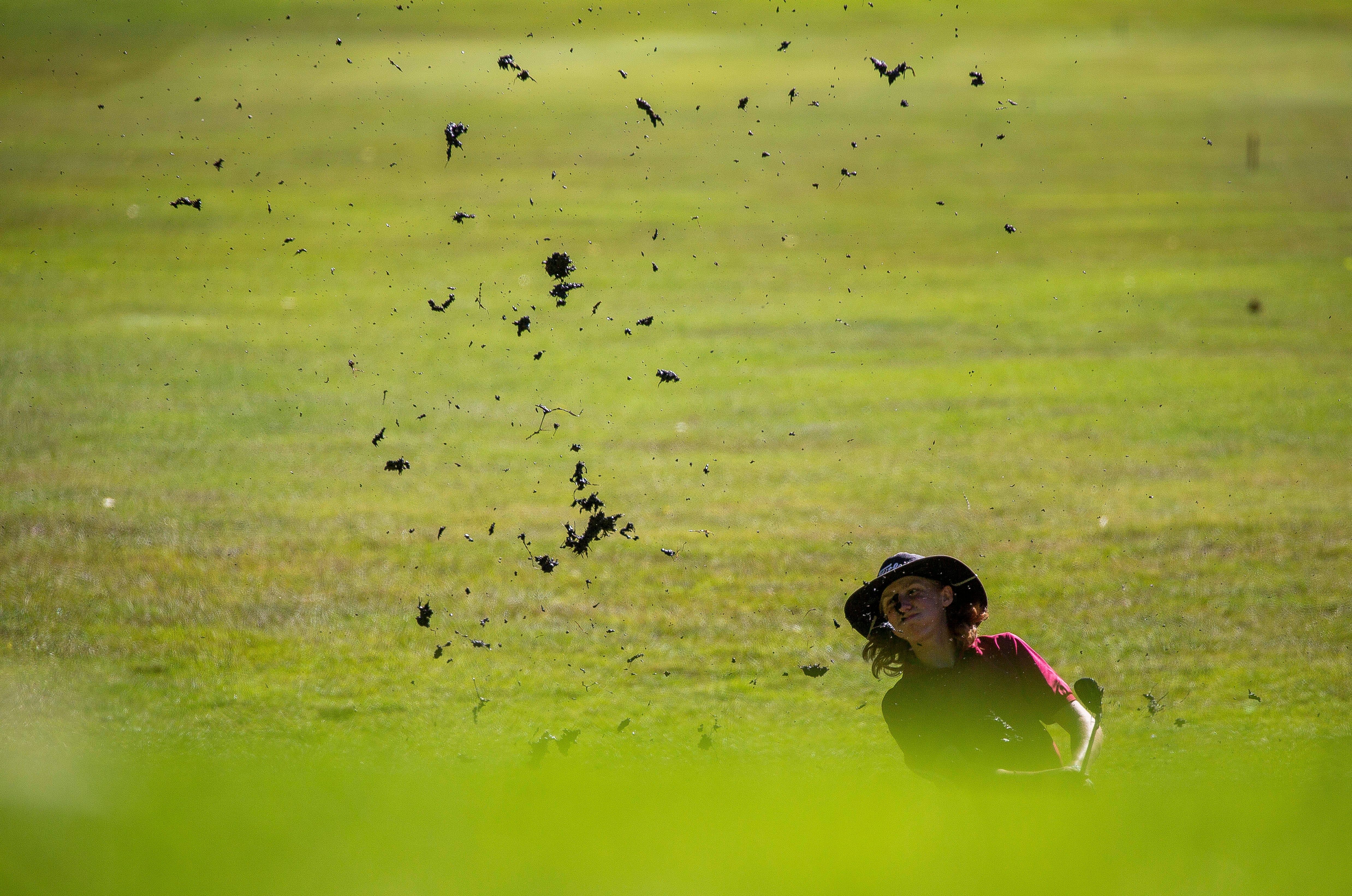 The soggy or softer conditions on the golf course create mudball in golf (Image via Imagn)