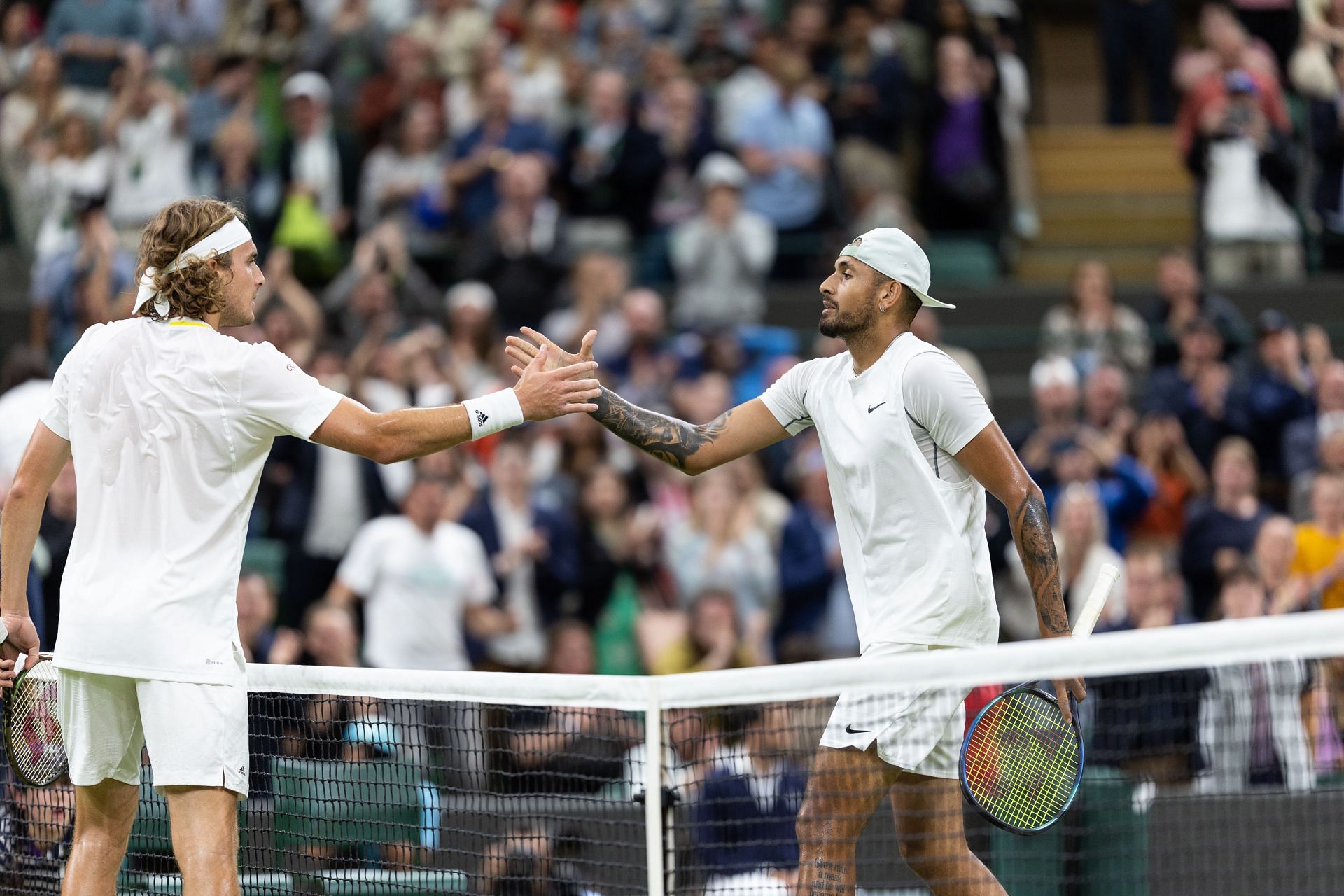 Nick Kyrgios (R) and Stefanos Tsitsipas at Wimbledon 2022 (Image: Getty)