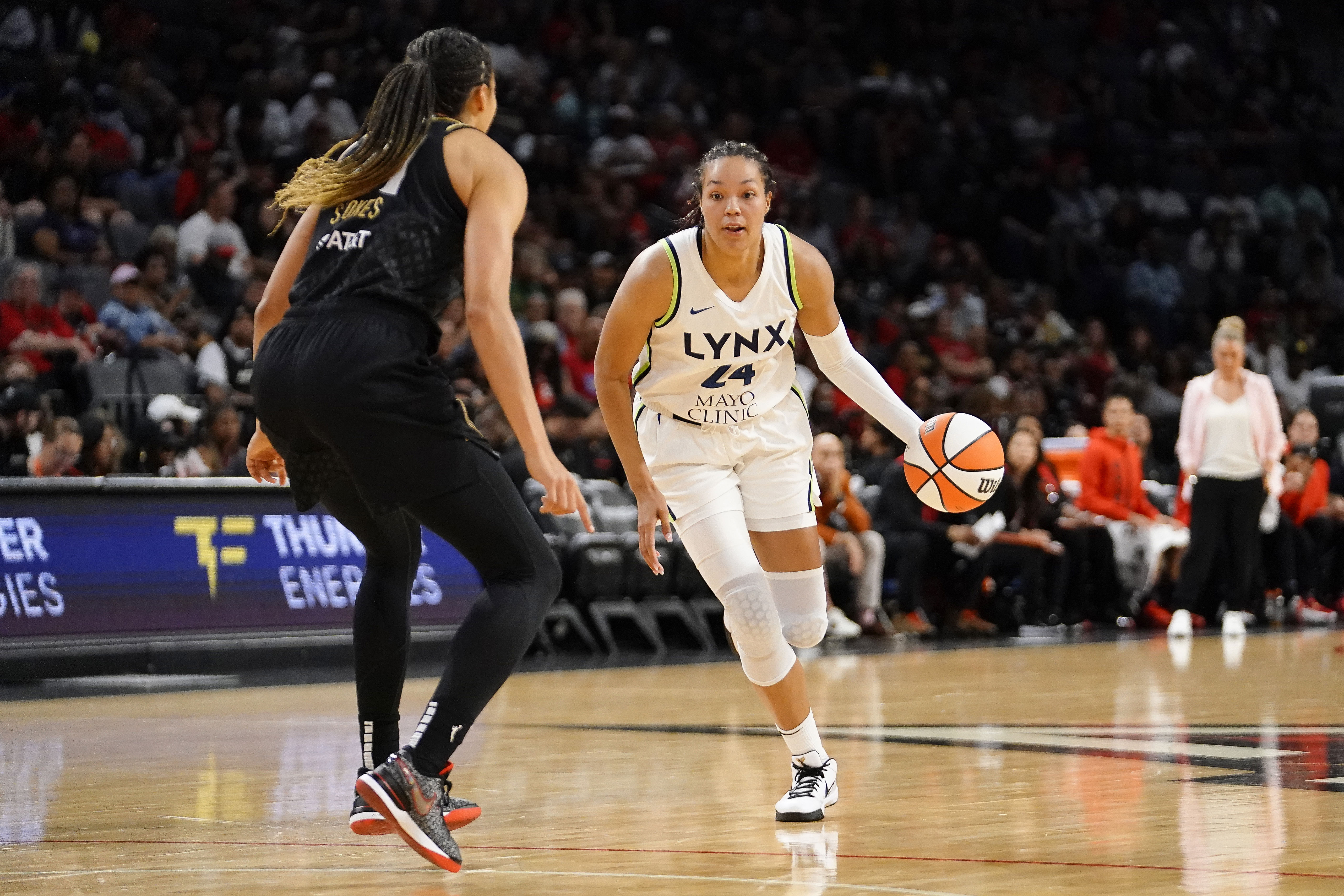 Minnesota Lynx forward Napheesa Collier (24) dribbles the ball against Las Vegas Aces at Michelob Ultra Arena. Photo Credit: Imagn