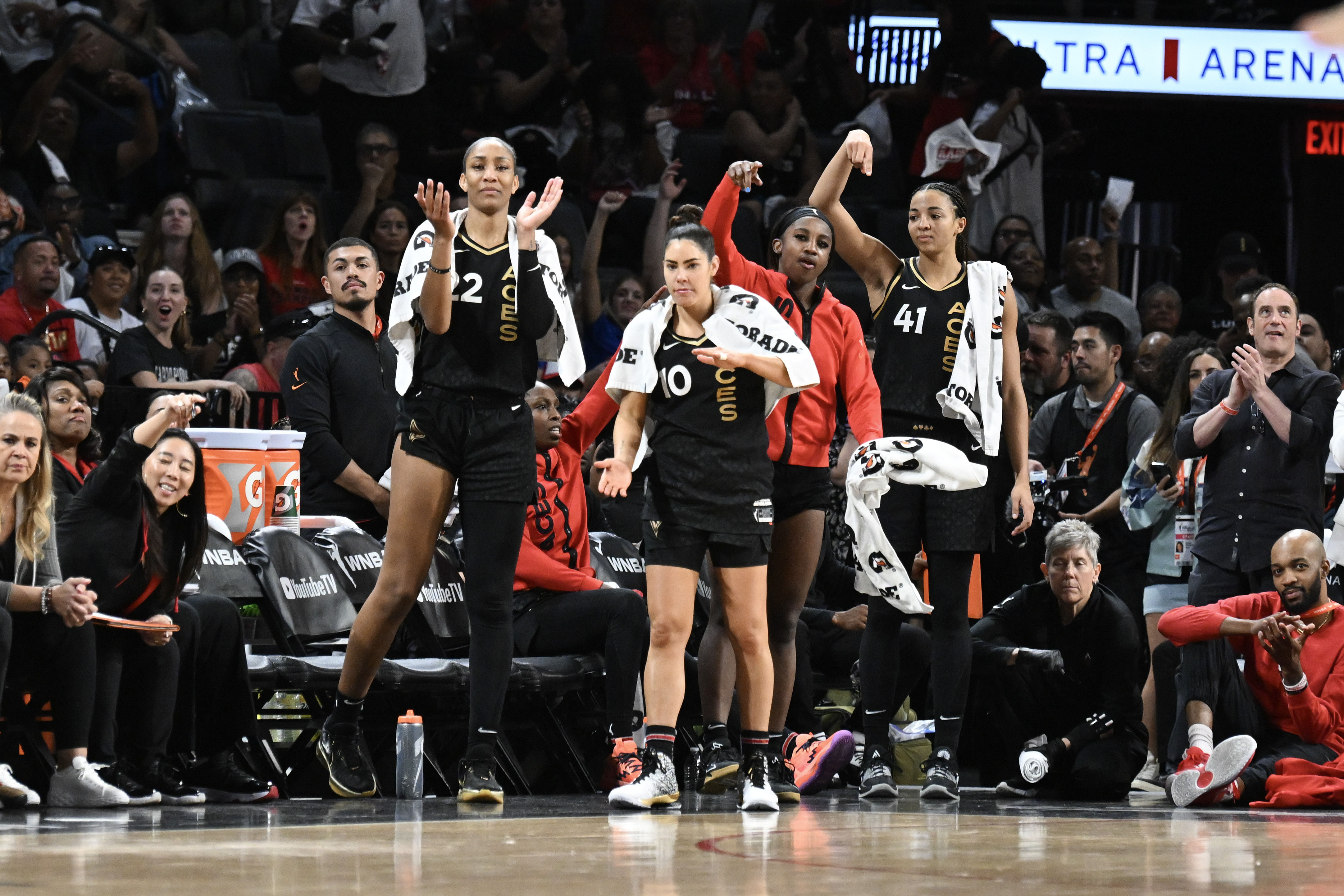 Las Vegas Aces A&#039;ja Wilson, Kelsey Plum, Jackie Young and Kiah Stokes react to a play against the New York Liberty. Photo Credit: Imagn