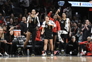 Las Vegas Aces A'ja Wilson, Kelsey Plum, Jackie Young and Kiah Stokes react to a play against the New York Liberty. Photo Credit: Imagn