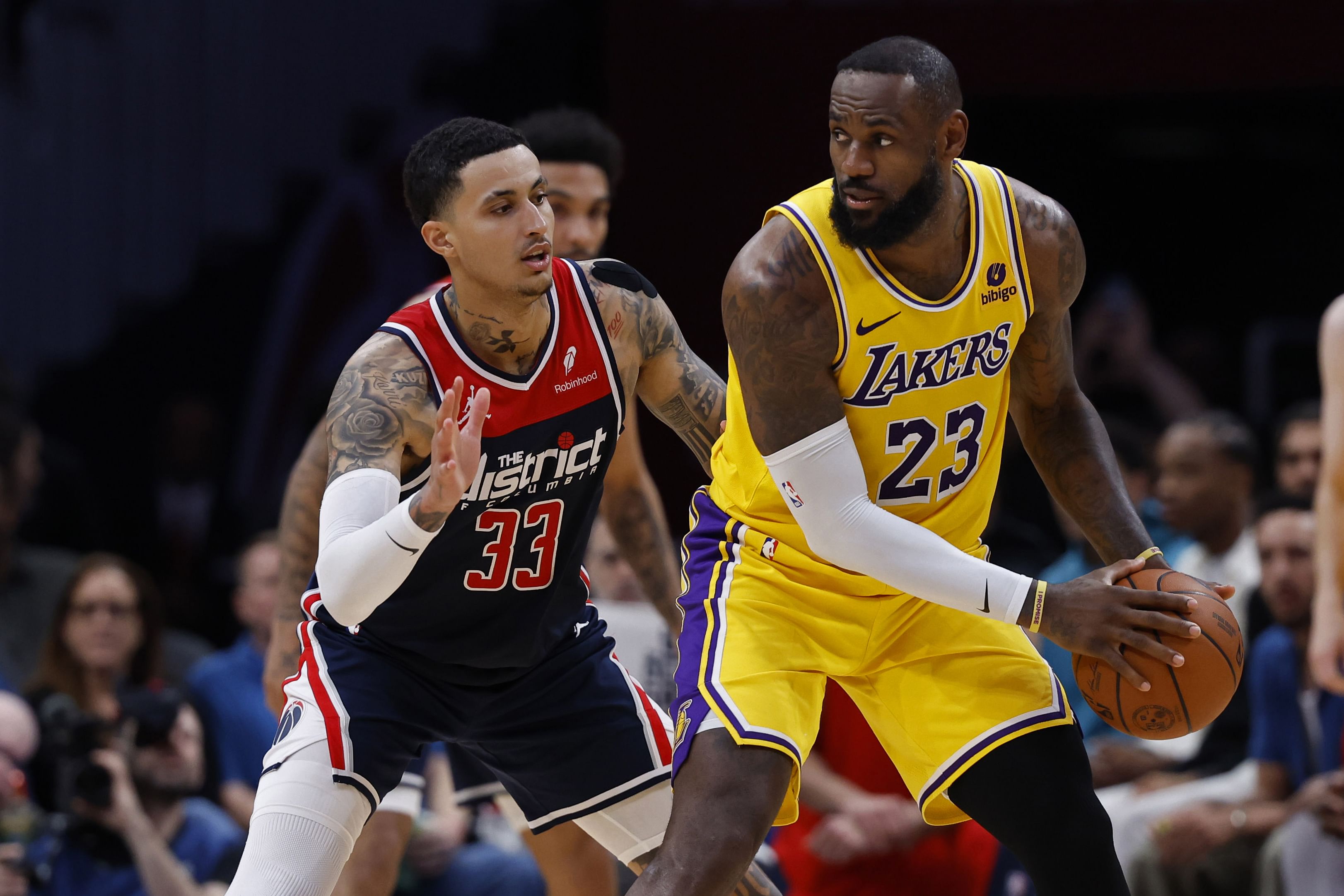 Washington Wizards forward Kyle Kuzma guarding LA Lakers forward LeBron James - Source: Imagn