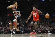 Houston Rockets guard Jalen Green dribbles the basketball against Portland Trail Blazers forward Kris Murray at Moda Center. Photo Credit: Imagn