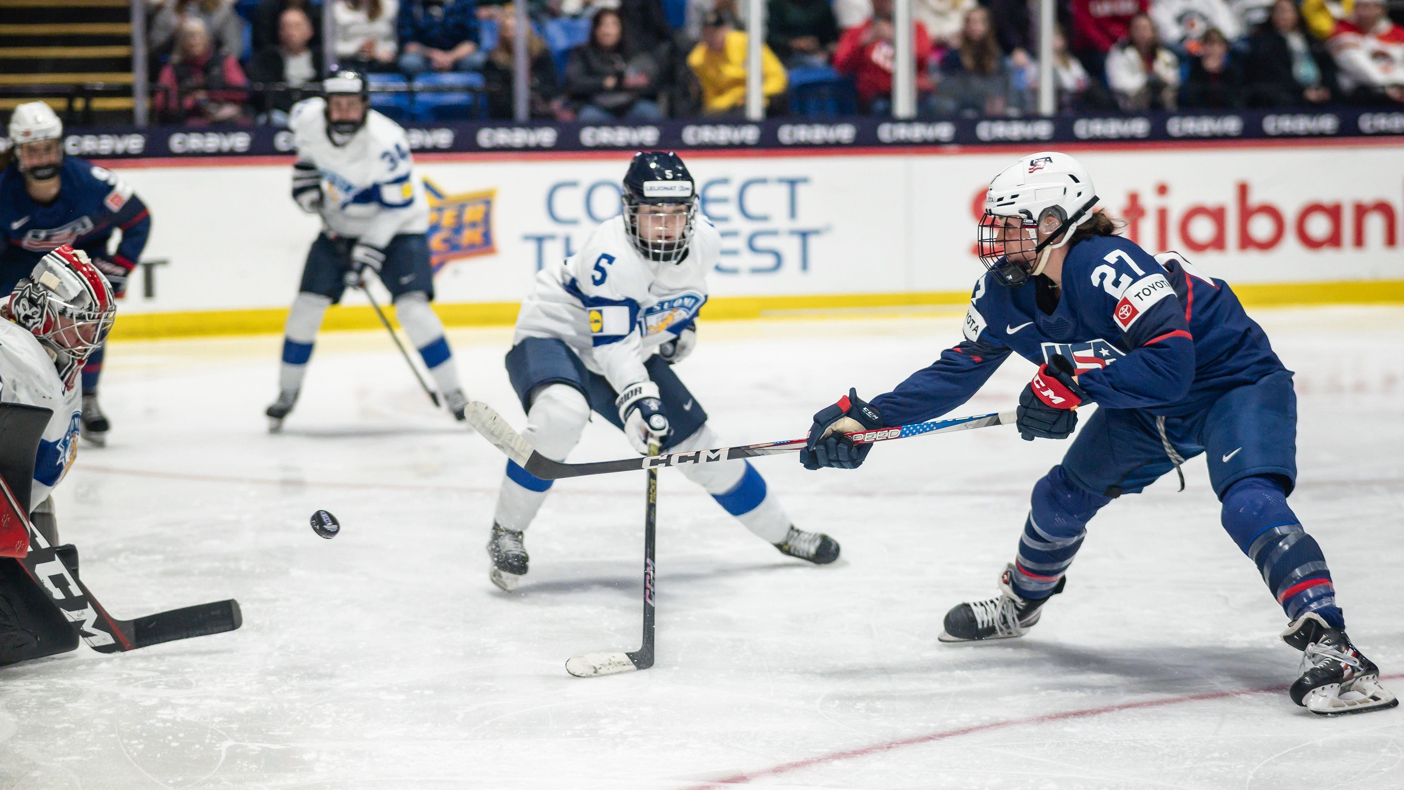 Taylor Heise shoots the puck for Team USA (Imagn)