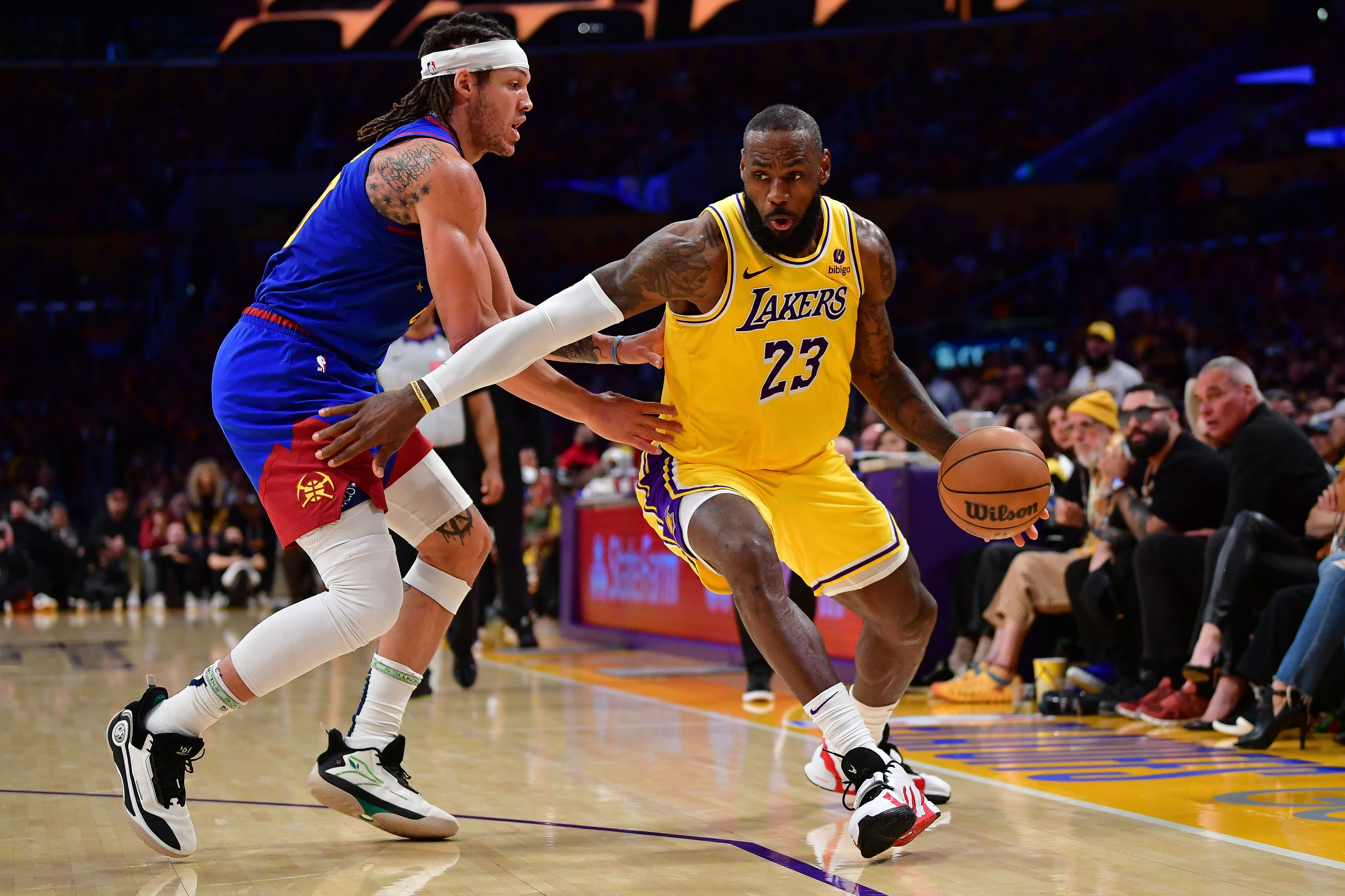 LeBron James moves to the basket against the Denver Nuggets during a game at Crypto.com Arena. Photo Credit: Imagn