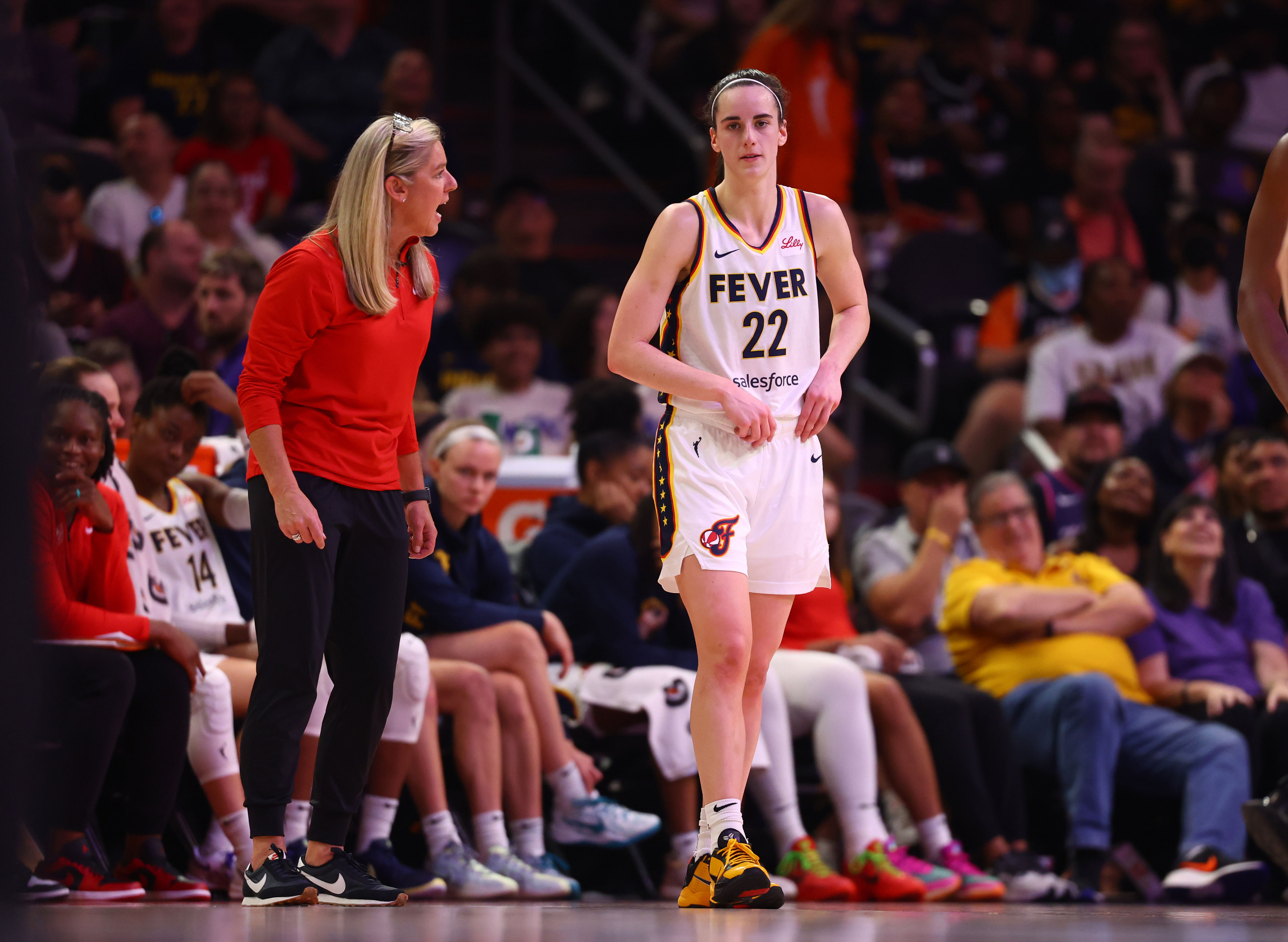 Indiana Fever head coach Christie Sides with guard Caitlin Clark against the Phoenix Mercury at Footprint Center. Photo Credit: Imagn